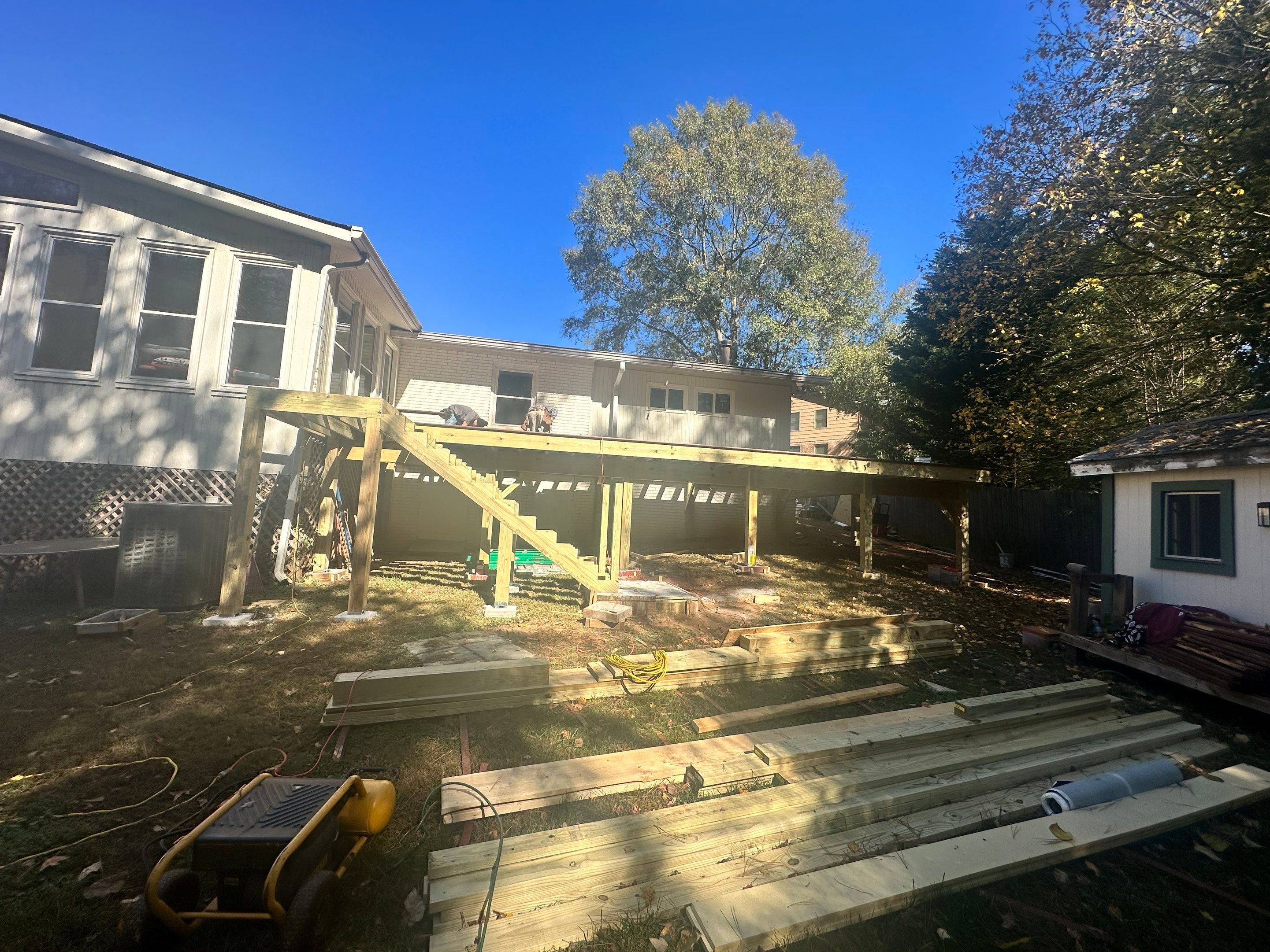 Elevated Composite Deck Rebuild With Metal Balusters in Marietta by Swift Home Renovations