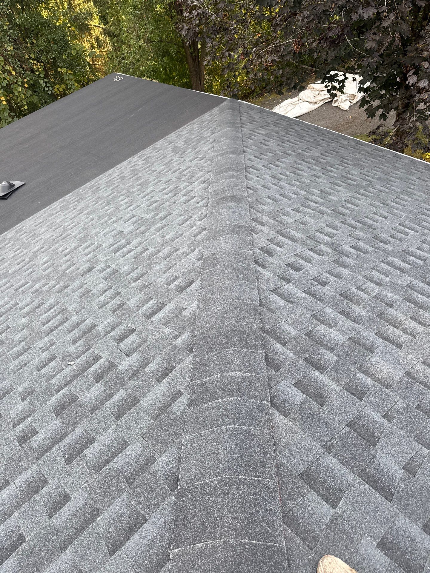 Residential Roofing Installation using GAF Timberline HDZ Charcoal by Rainstoppers Roofing