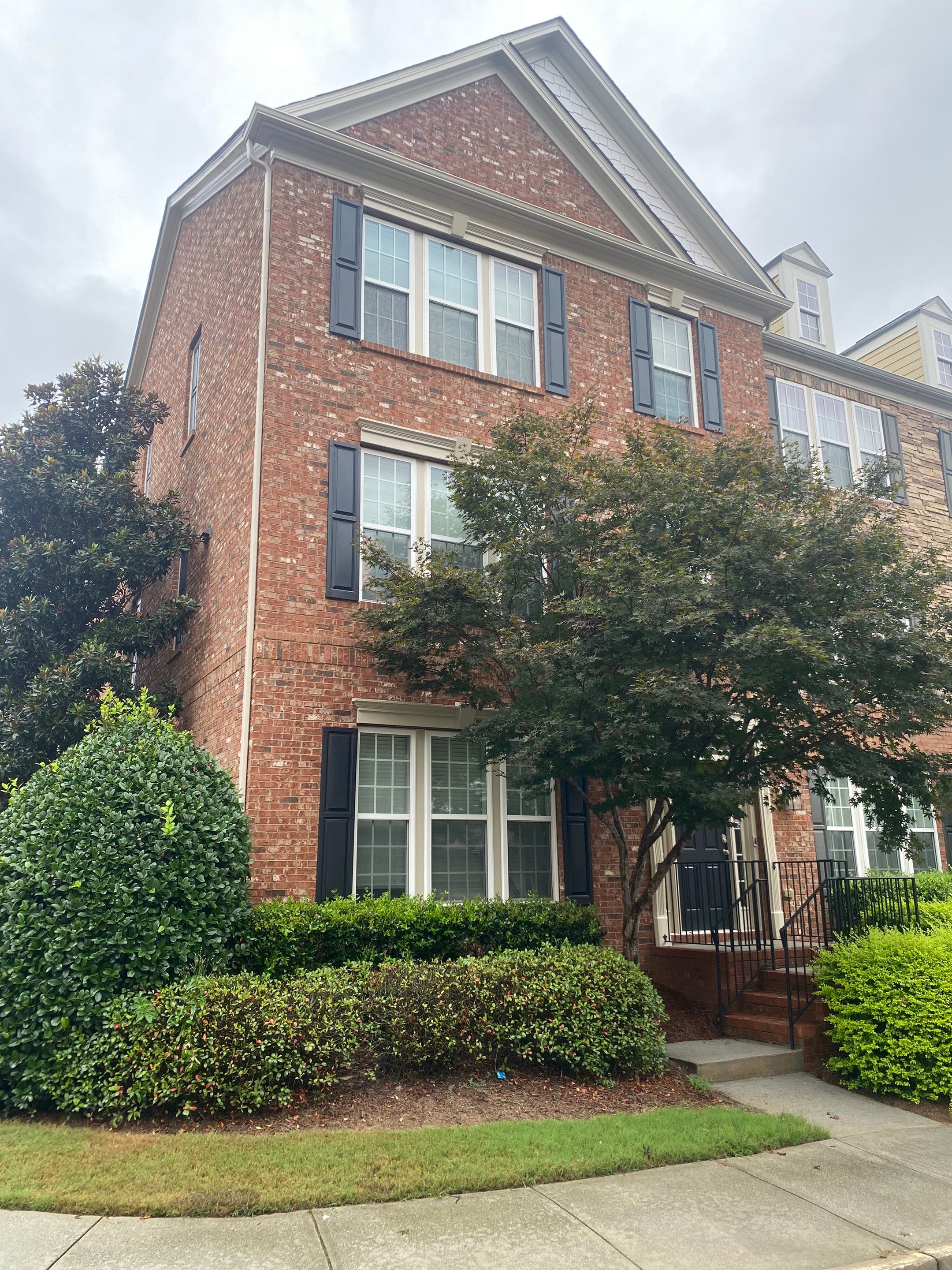 Exterior Trim and Shutter Painting for Atlanta Brick Townhomes by Swift Home Renovations