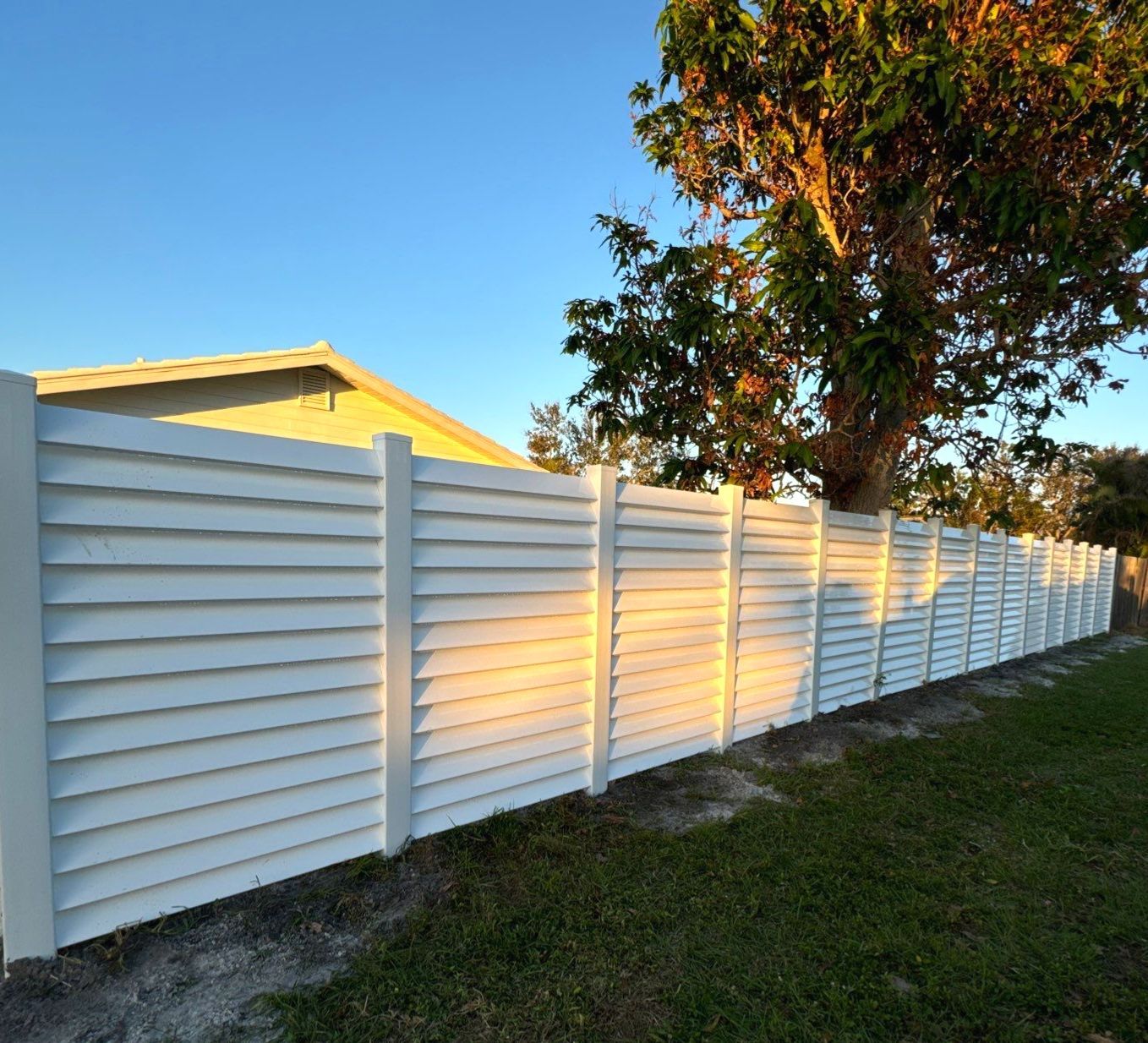 Vinyl Fence Installation using 6Ft Professional Grade White Vinyl Louvered Privacy Fence by Asap fence and gates, LLC