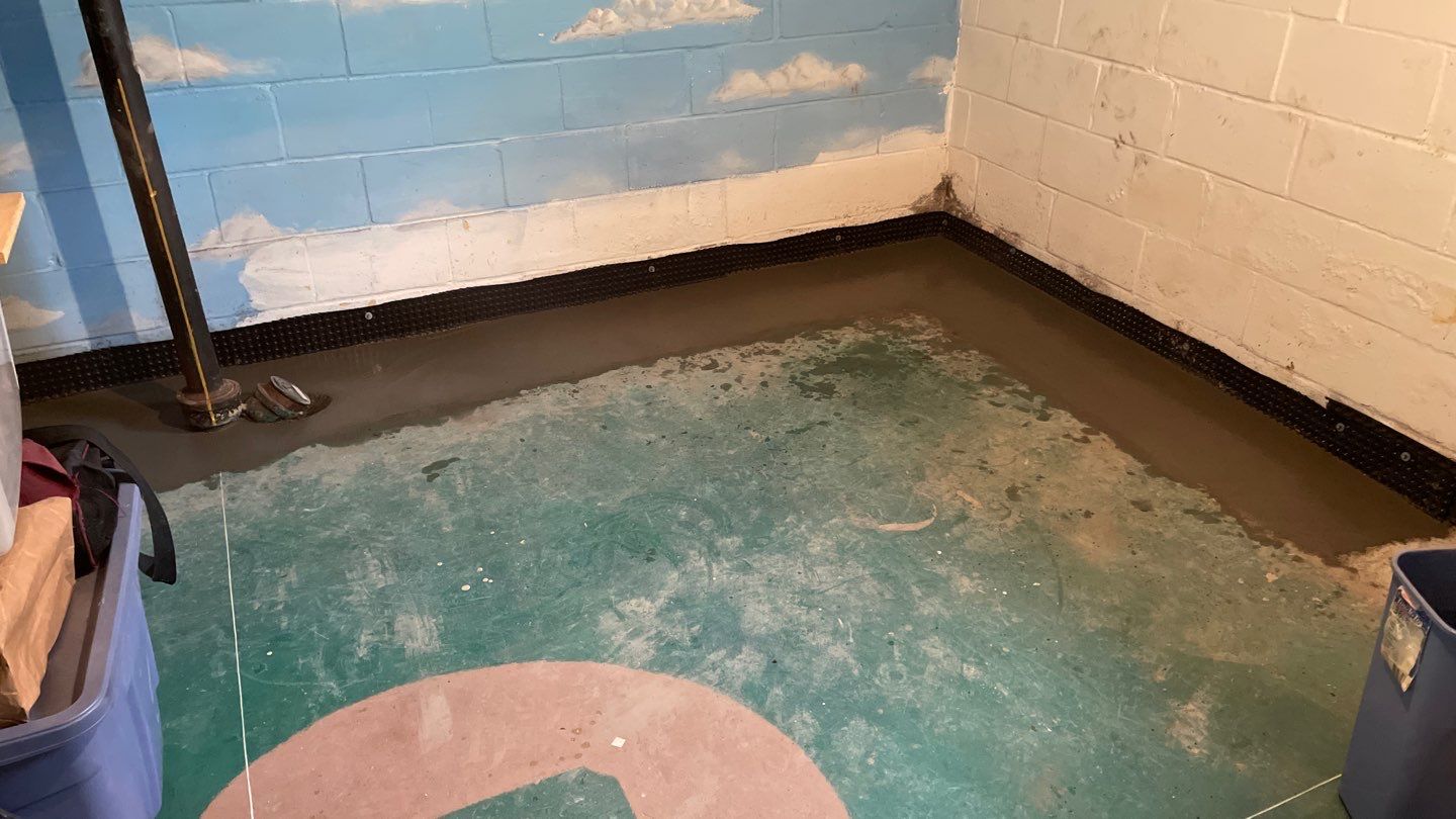 Completing the Connection for Lisa's Drain Tile System by Waterproofing Northeast