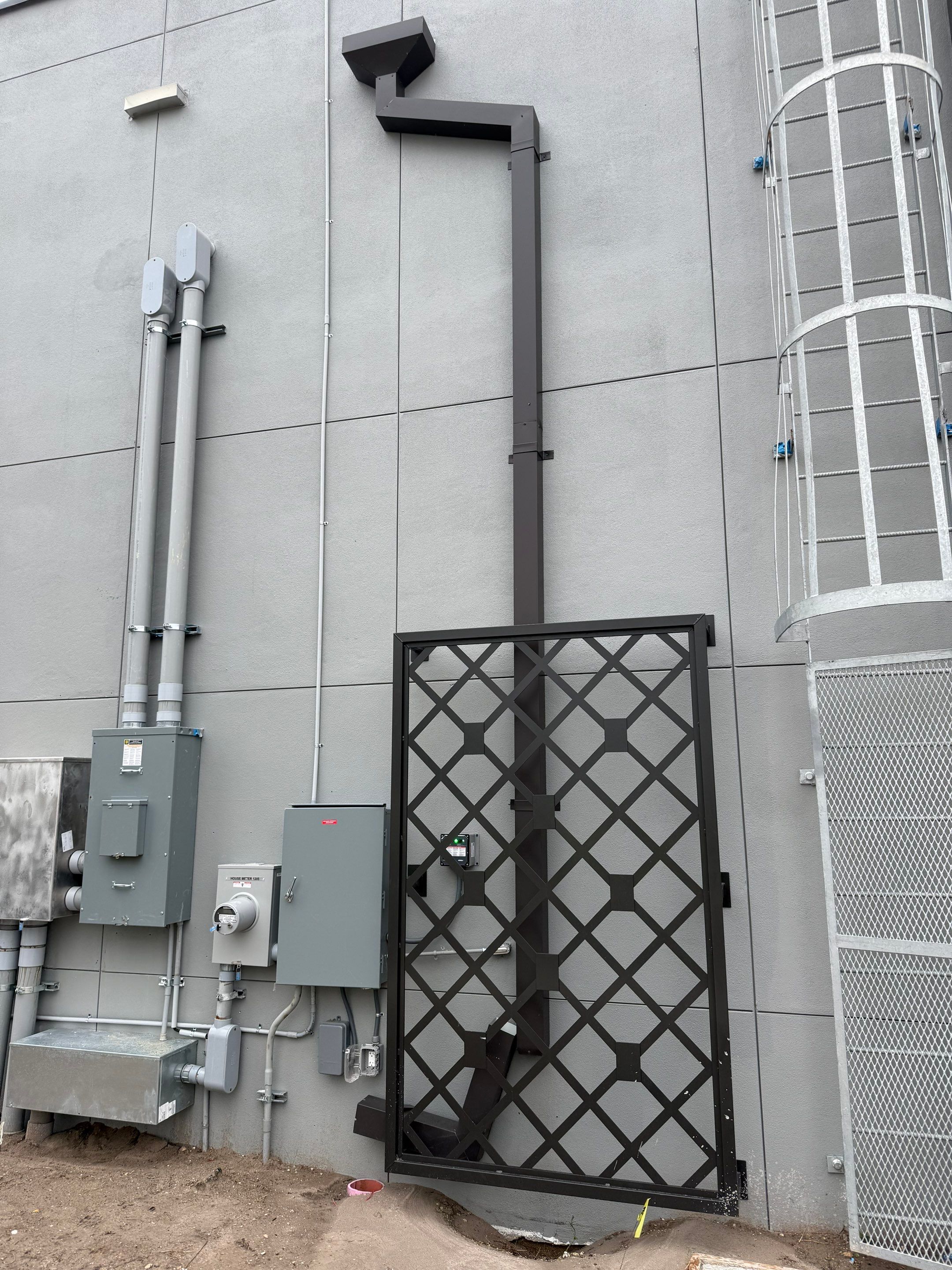 Downspout Installation using collector head in Cape Coral FL by Gutter Professors