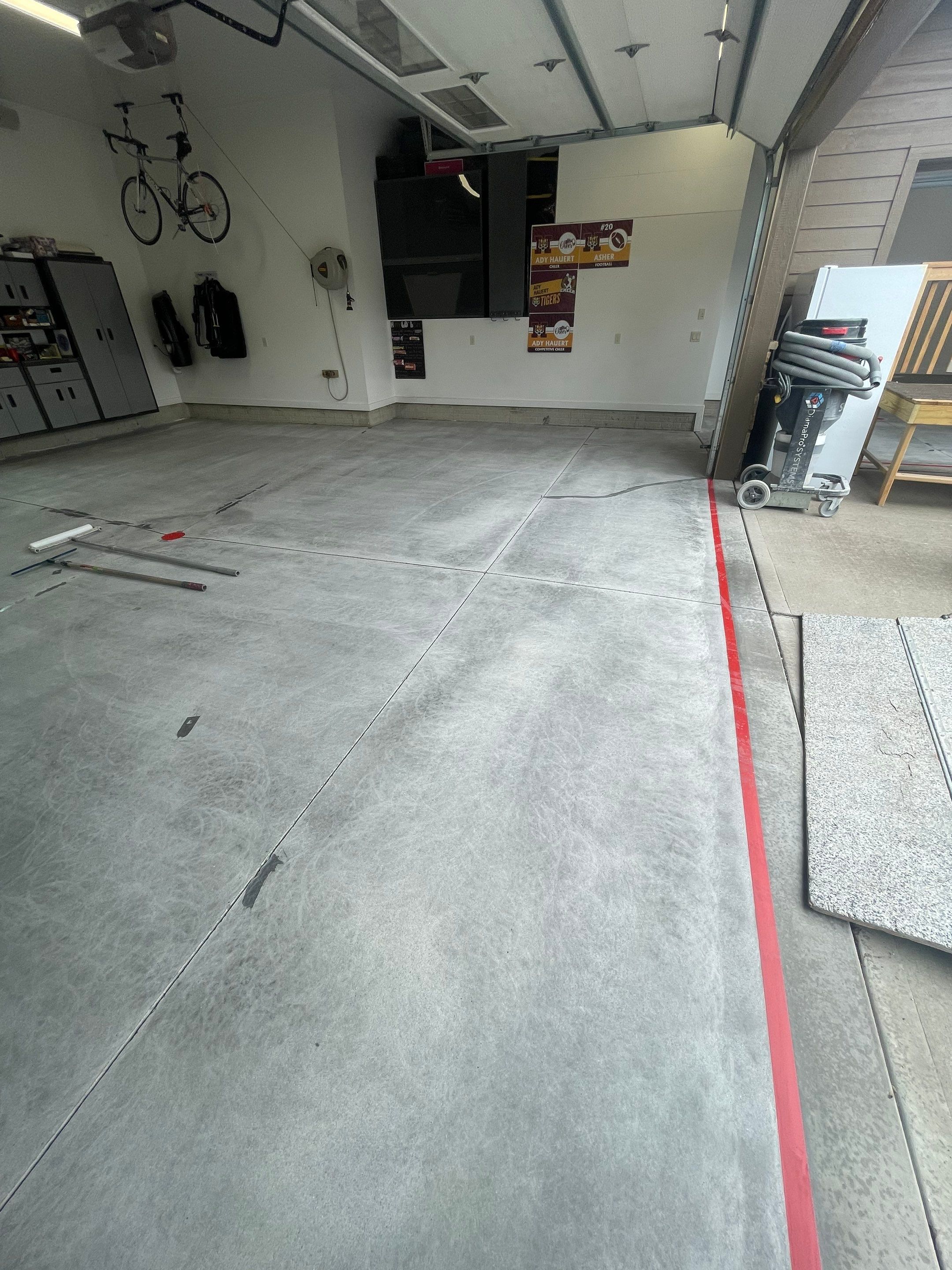 Garage Floor Coating and Domino Flake Finish in Sioux Falls by Select Painting, Coatings & Garage Cabinets