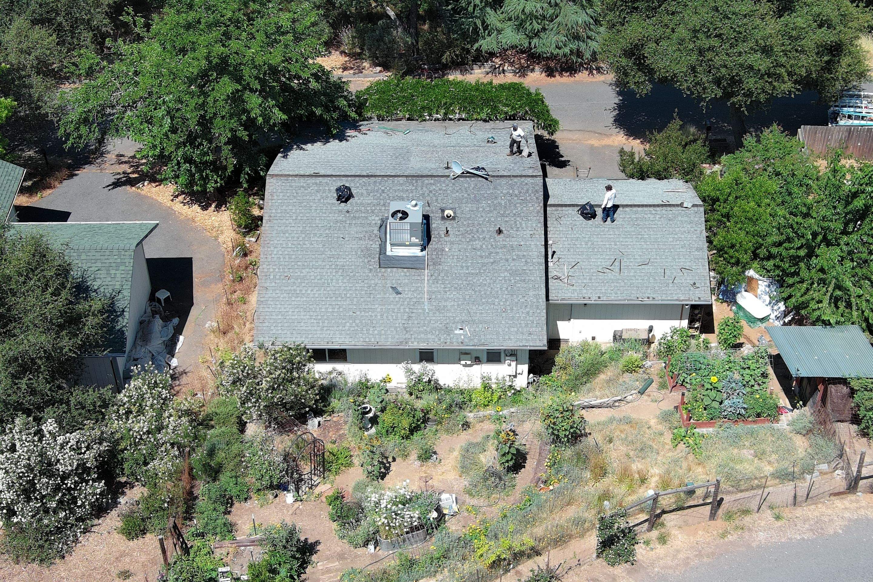 Metal roofing installation using ASC Standing Seam metal by Straight Edge Roofing Inc