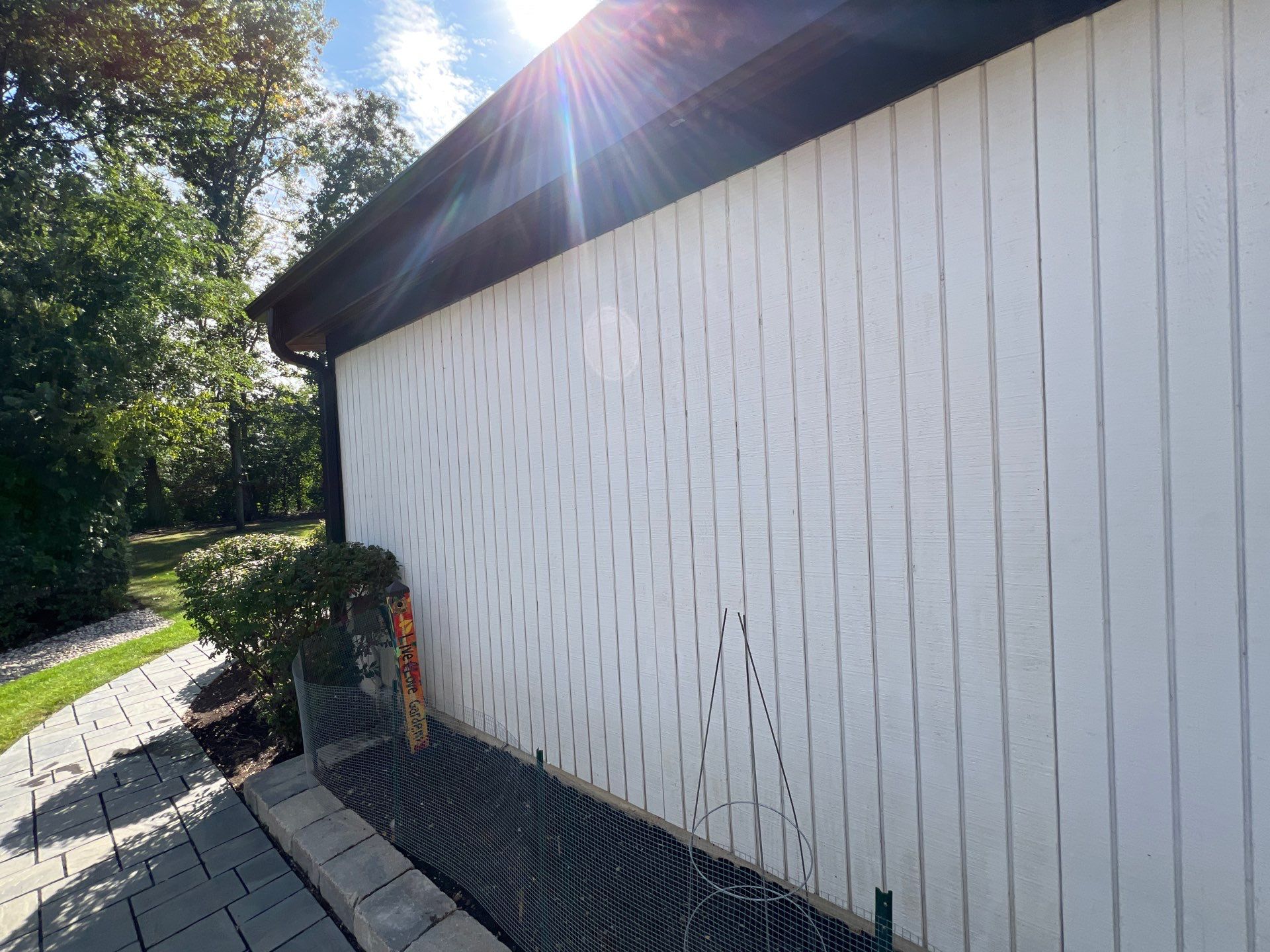 Complete Exterior House, Bluestone & Garage Floor Cleaning by Northern Power Washing LLC.