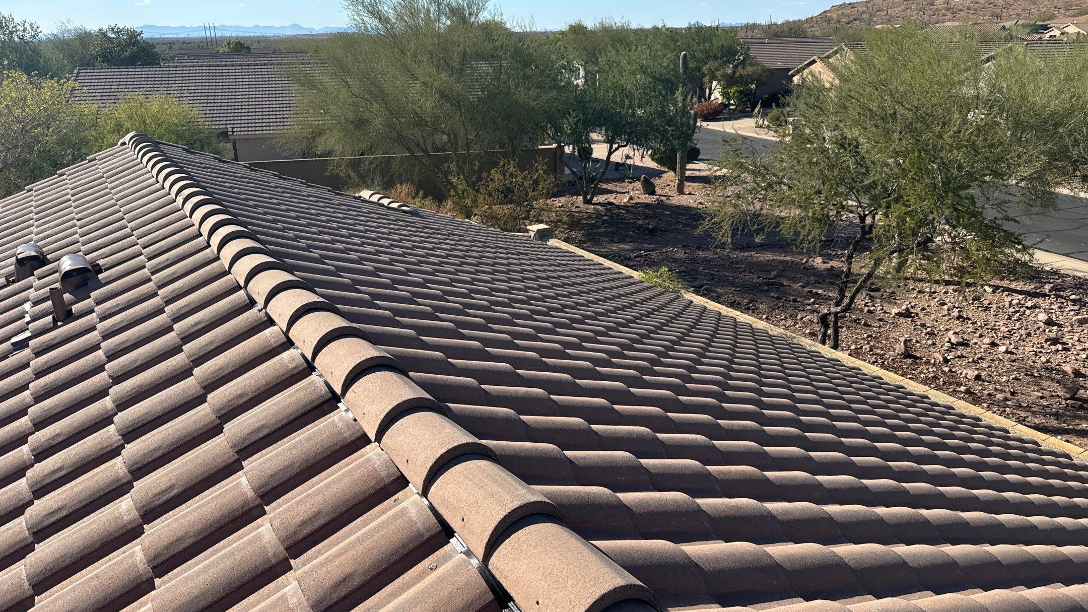 Residential Roofing Installation using Clay Tile by Weather-Tite Exteriors LLC