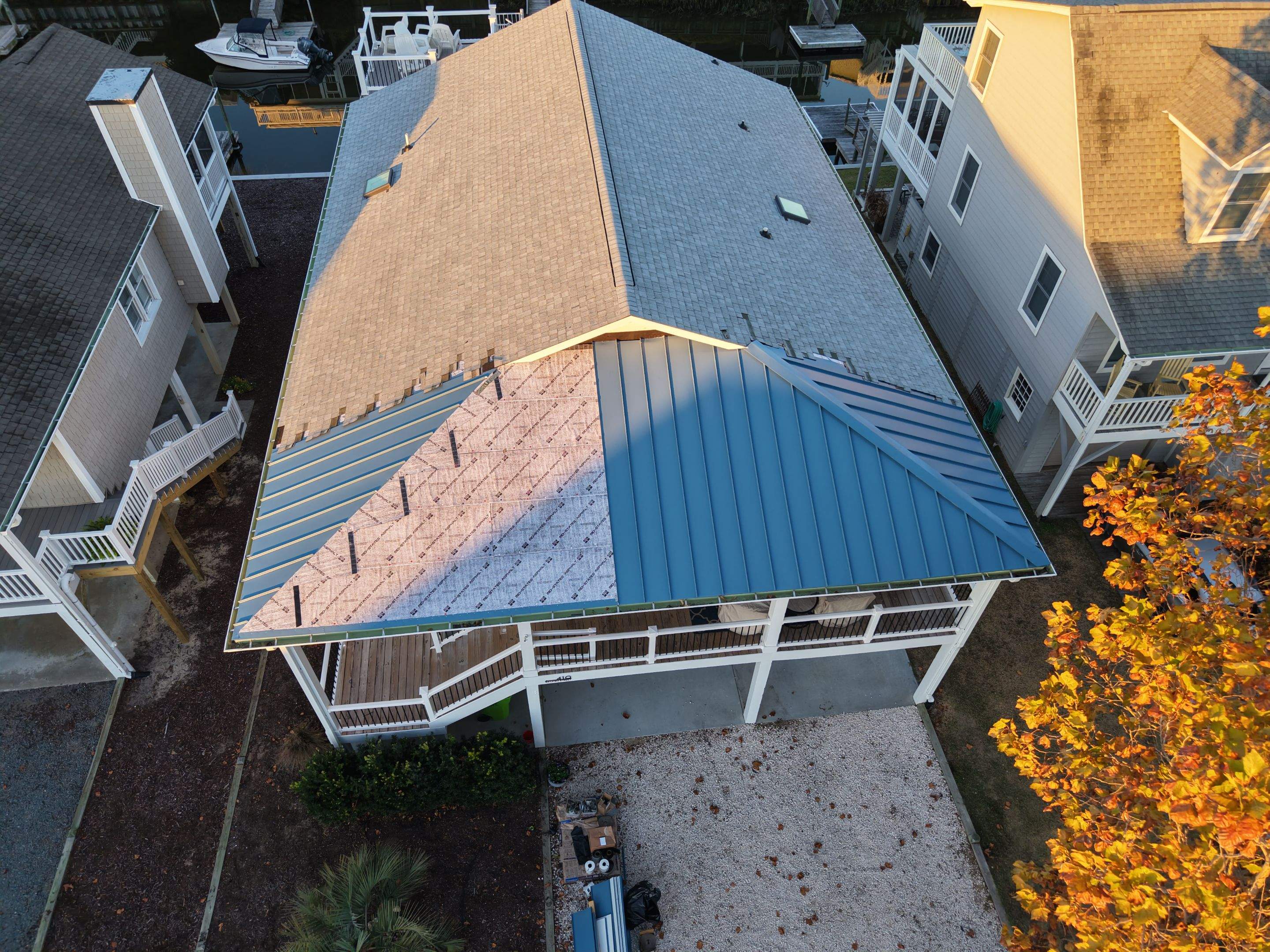 Standing Seam Metal Roof & Silver Birch Shingle Upgrade in Sunset Beach, NC by RGR Construction and Roofing, LLC