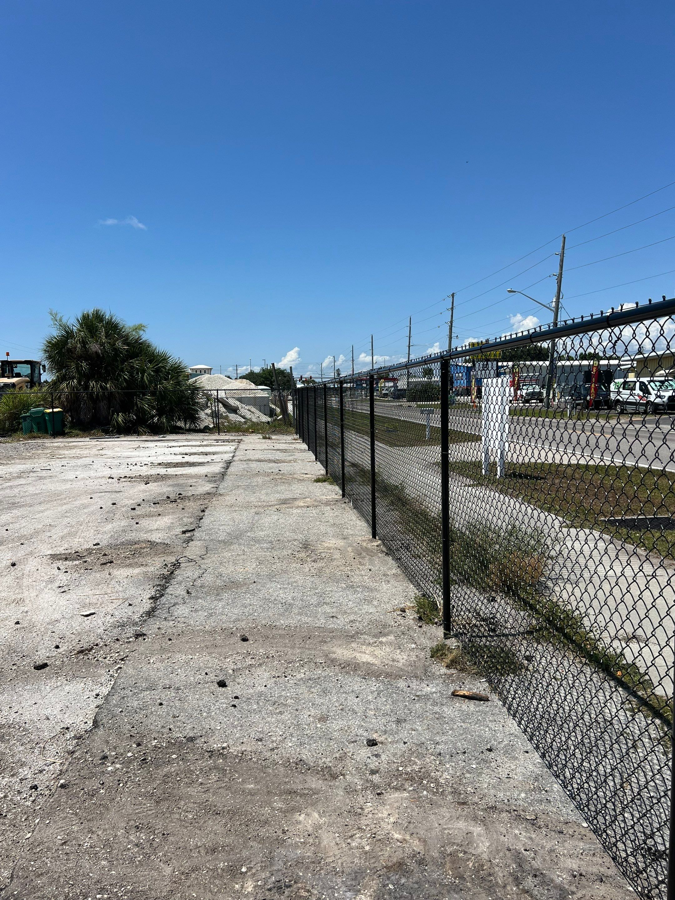 Chain-link Fence Installation using 6ft Black Chain Link Fence  by Asap fence and gates, LLC