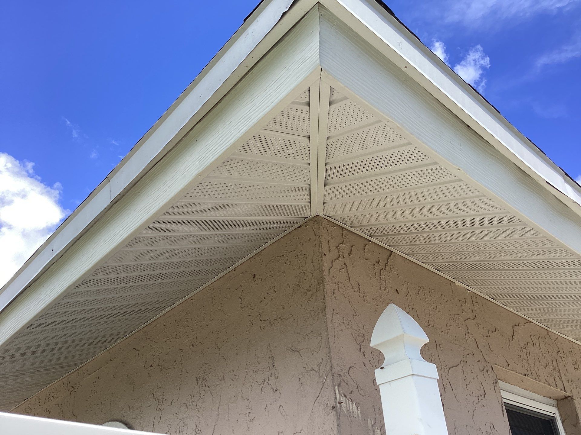 White Seamless Gutters and Splash Guards in Fort Myers FL by Gutter Professor by Gutter Professors