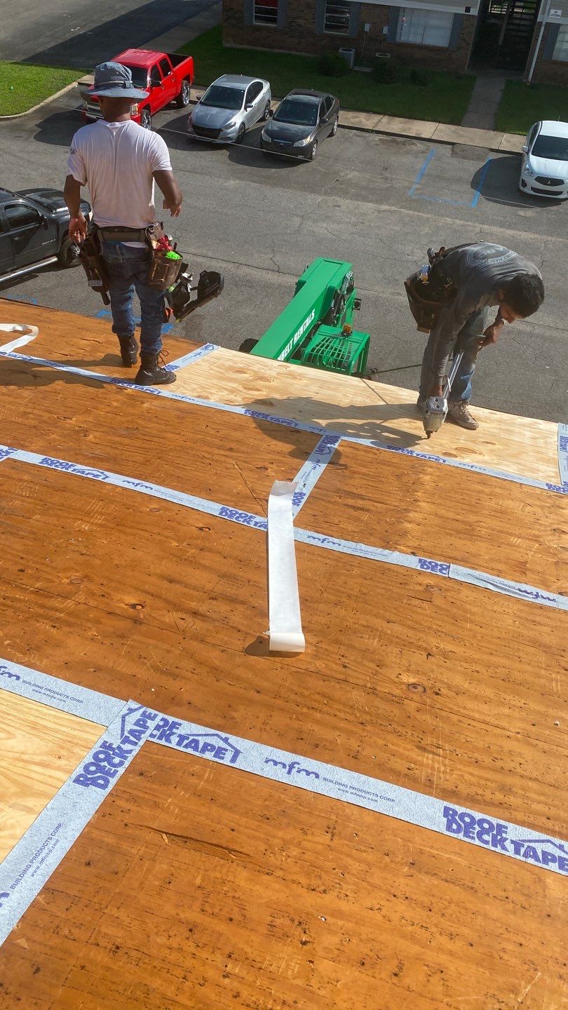 Commercial Roofing Installation using Roof Replacement by American Roofing & Construction LLC