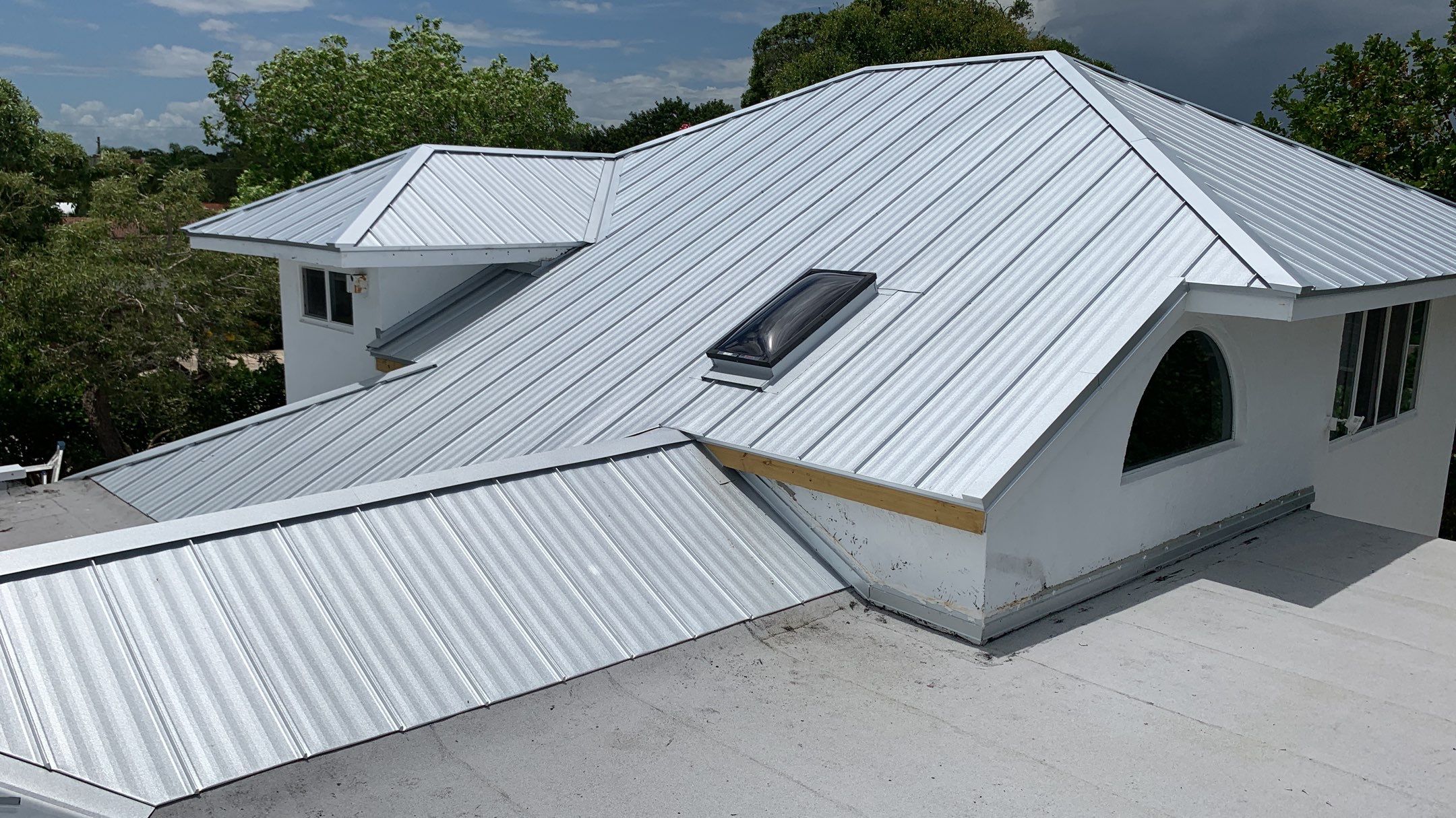 Residential Roofing Installation using 1" Nail strip metal roof by BLUES BROTHERS ROOFING
