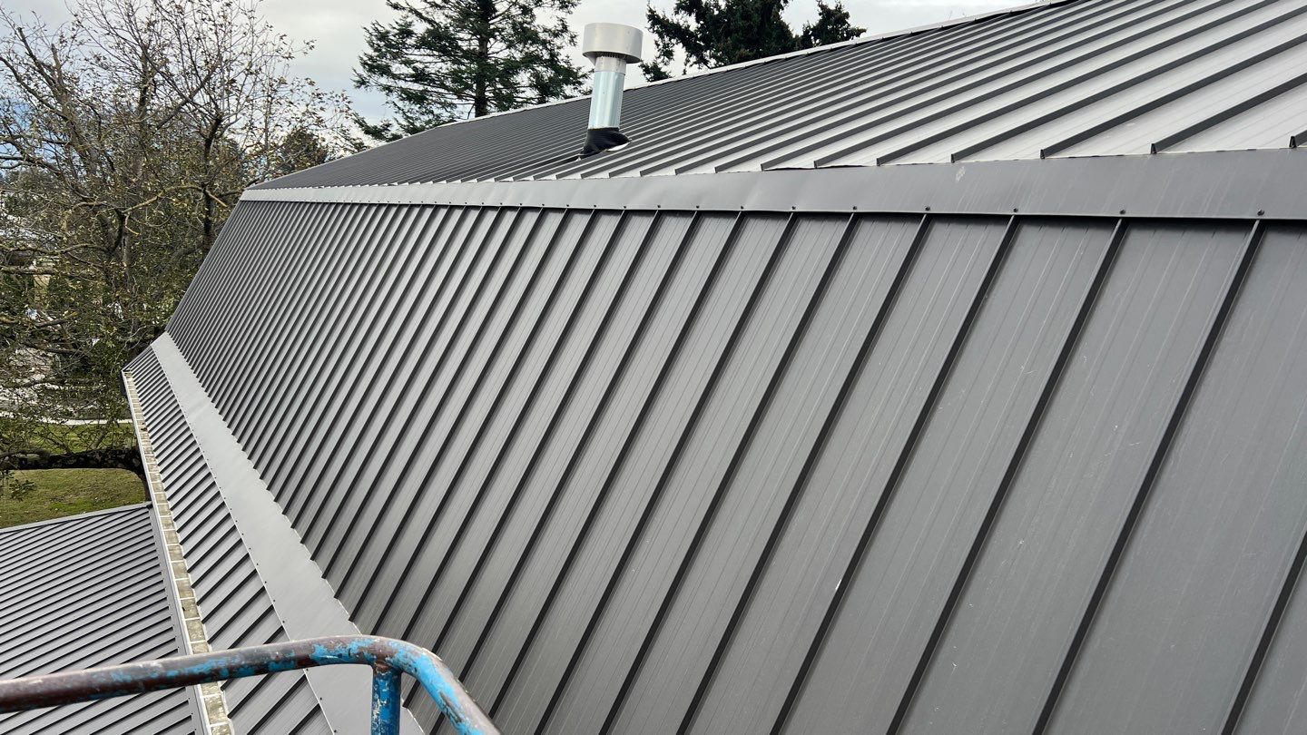 Commercial Roofing Installation using 12" Prolok metal  by Top Notch Roofing Inc