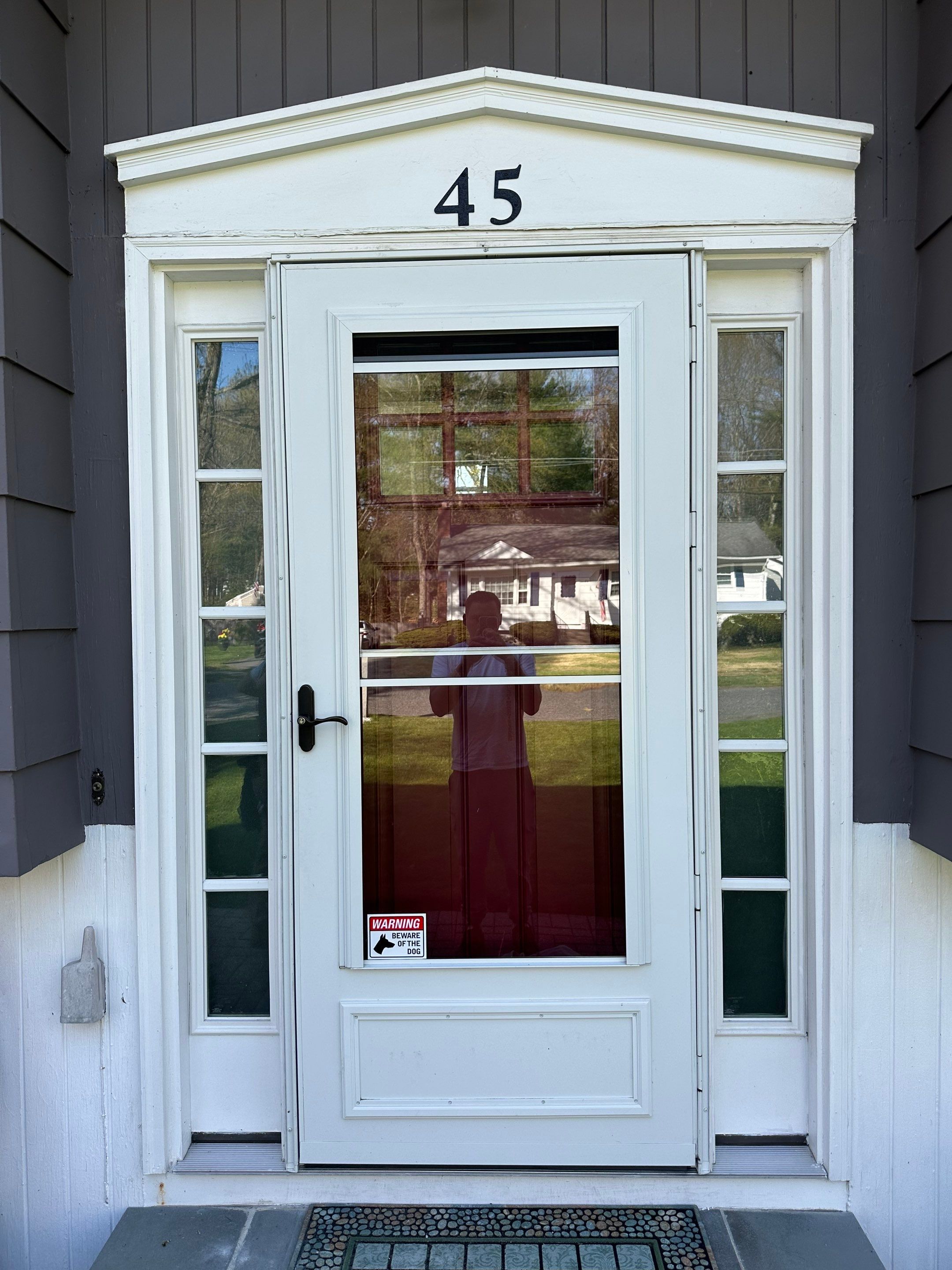 Siding and door replacement in Holliston, MA by UBrothers Construction
