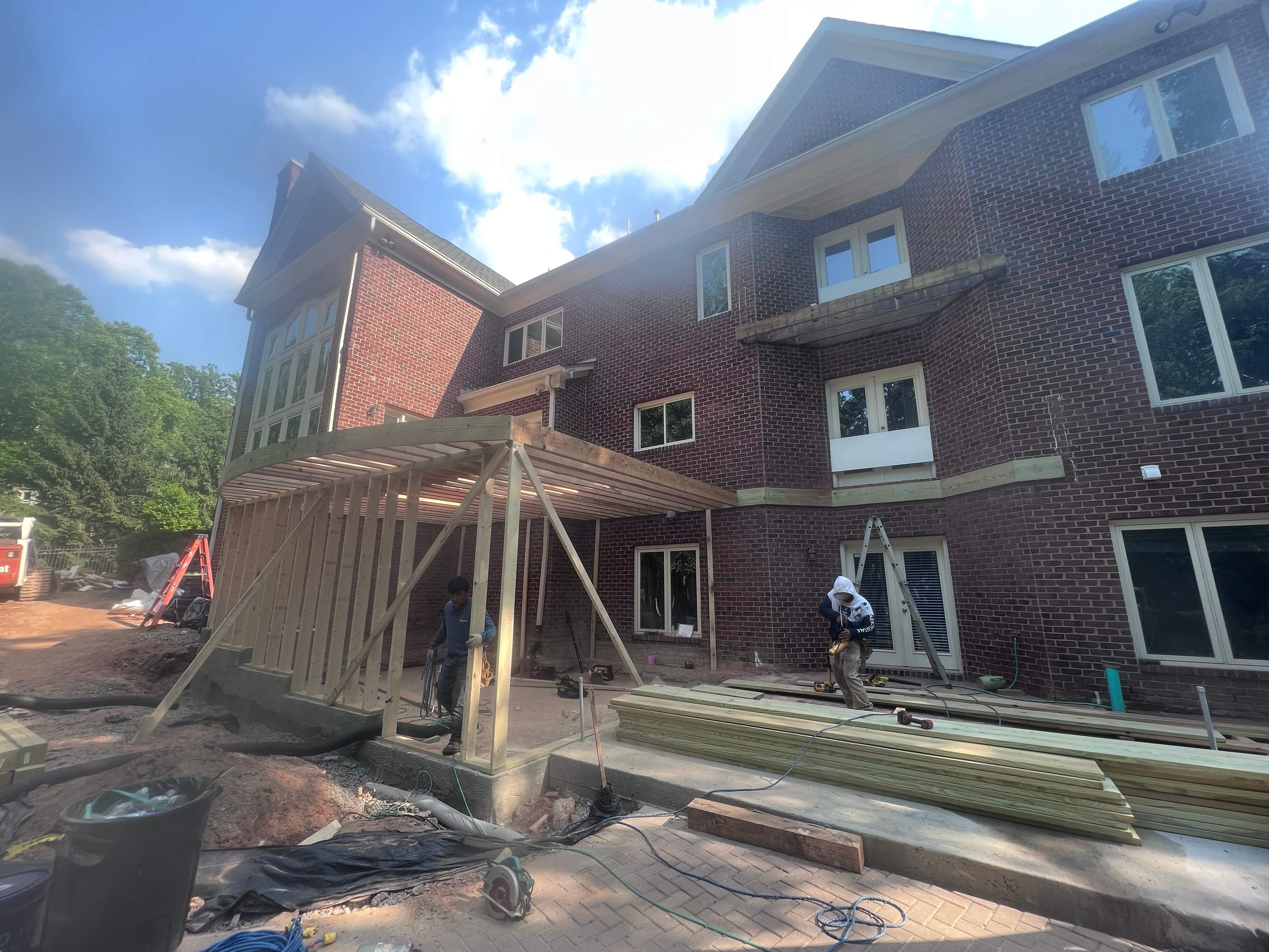 Custom Multi-Level Deck, Outdoor Kitchen & Pool Patio in McLean, VA by Sunburst Construction Inc