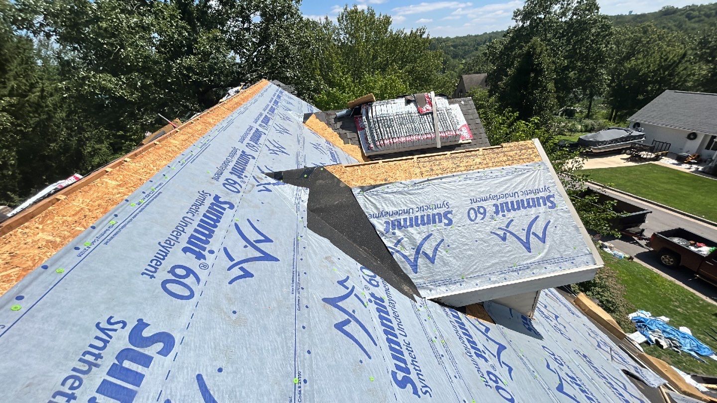 Residential Roof + Gutters & Downspouts & Gutter Guards  by Titan Commercial & Residential Roofing 