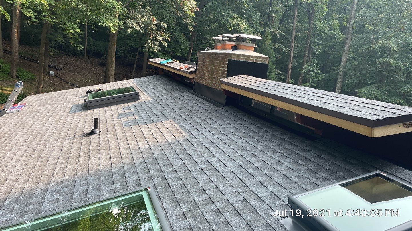 Deckhouse Roof Replacement by American Home Contractors