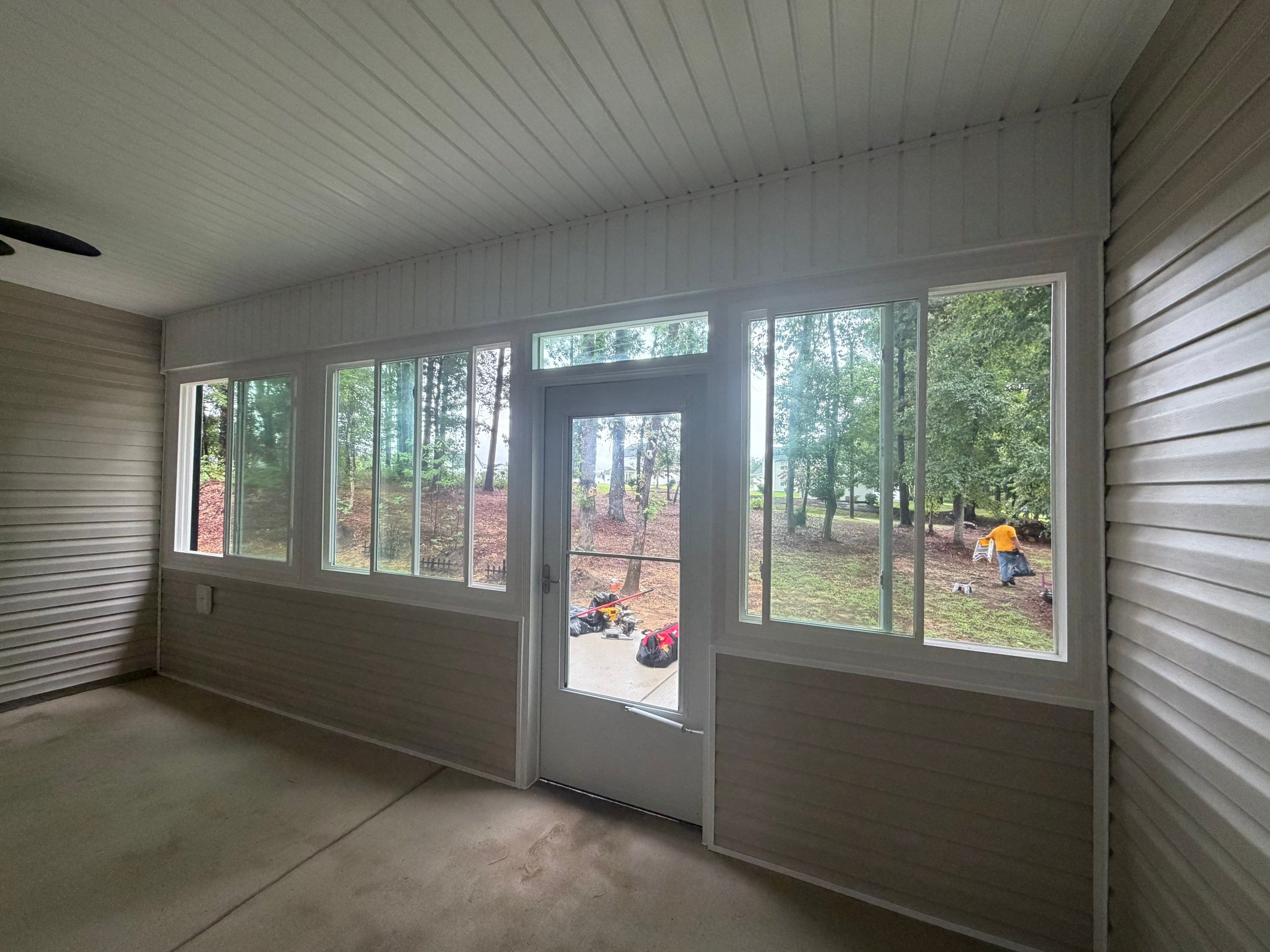 Custom Screen Porch and Concrete Patio Installation in Selma by The Remodeling Company