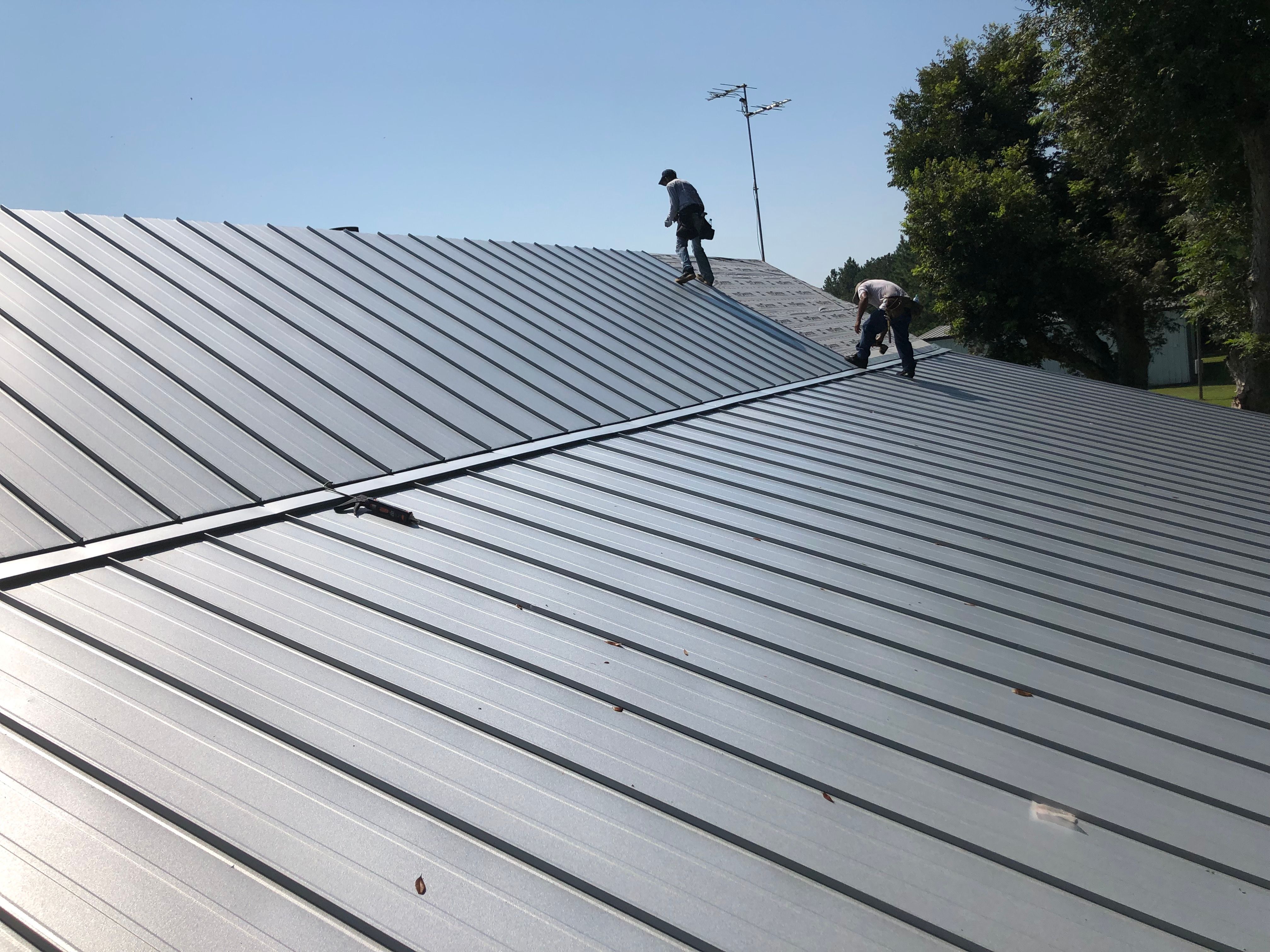 Residential Roofing Installation using Metal roofing by American Roofing & Construction LLC