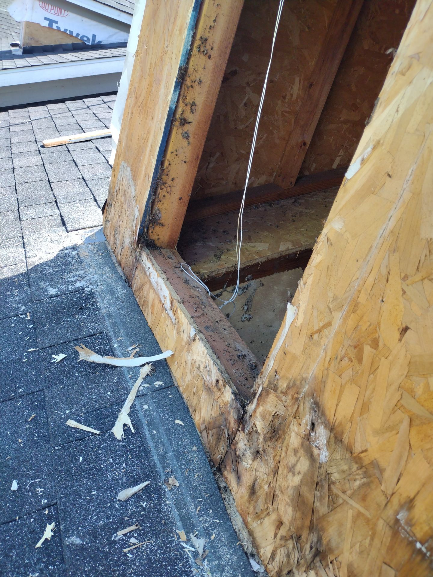 Residential Roof Replacement with Metal Accents by Orezona Building & Roofing Company, Inc.