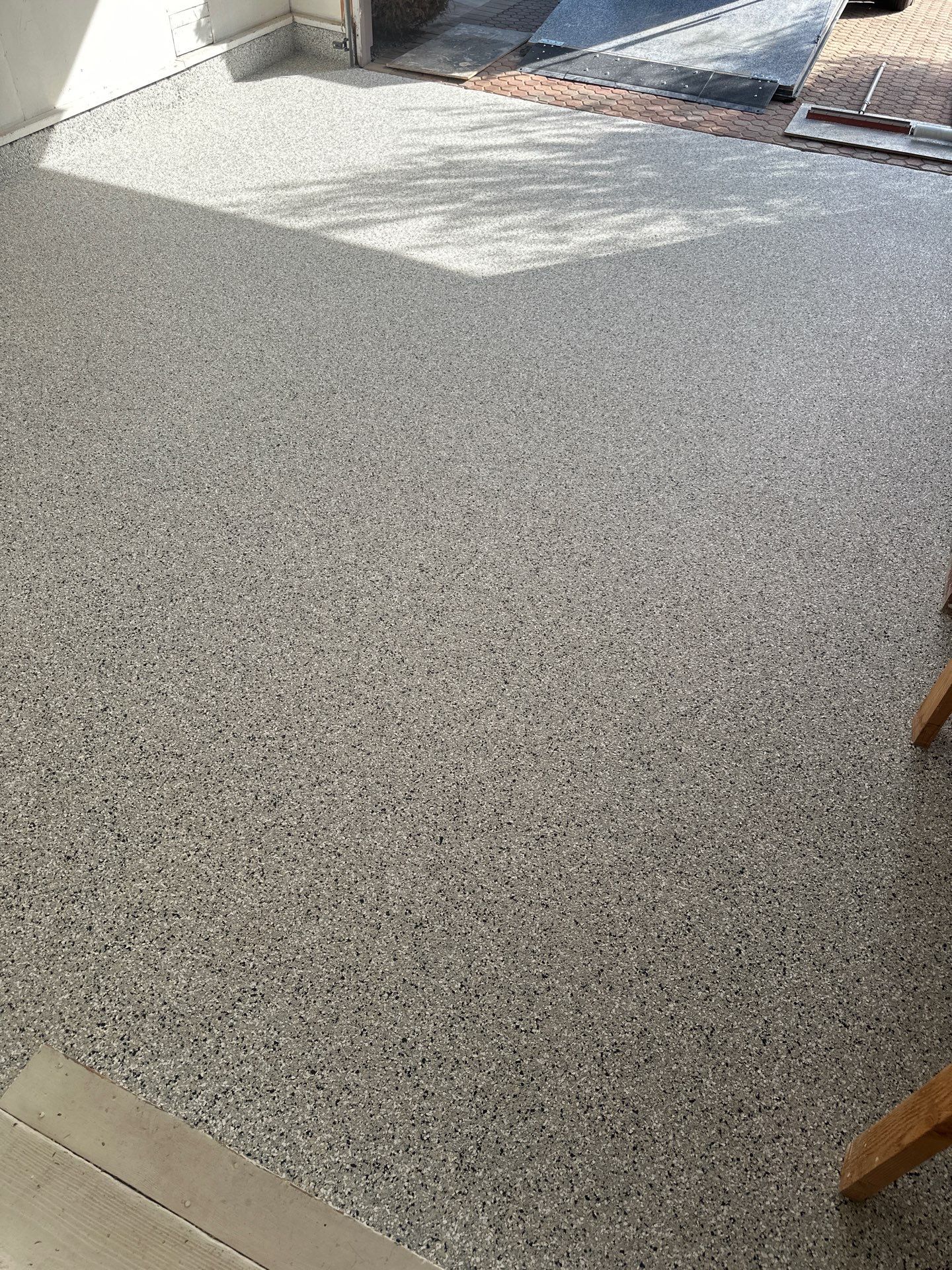 Polyurea Garage Floor Coating with Cabin Fever Decorative Chips in Cambria by MGP Coatings