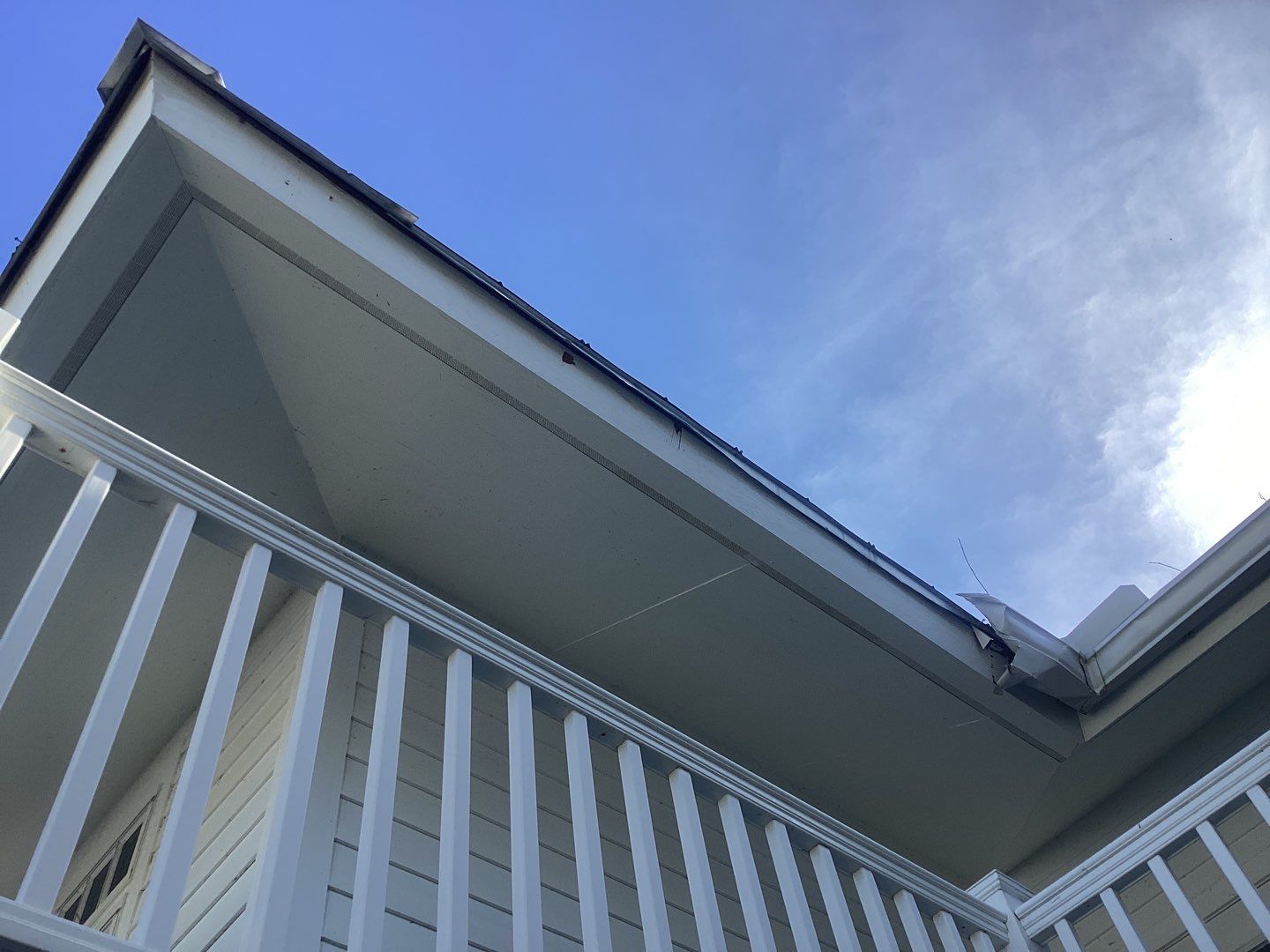 White Gutter Installation in Sanibel FL by Gutter Professors