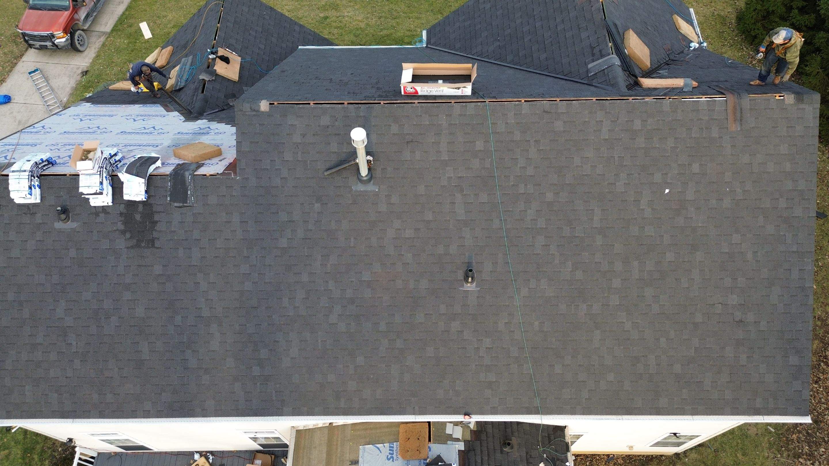 Walden Ponds - Pristine Black and Hydro Flo Gutter Guards by Tamlin Roofing