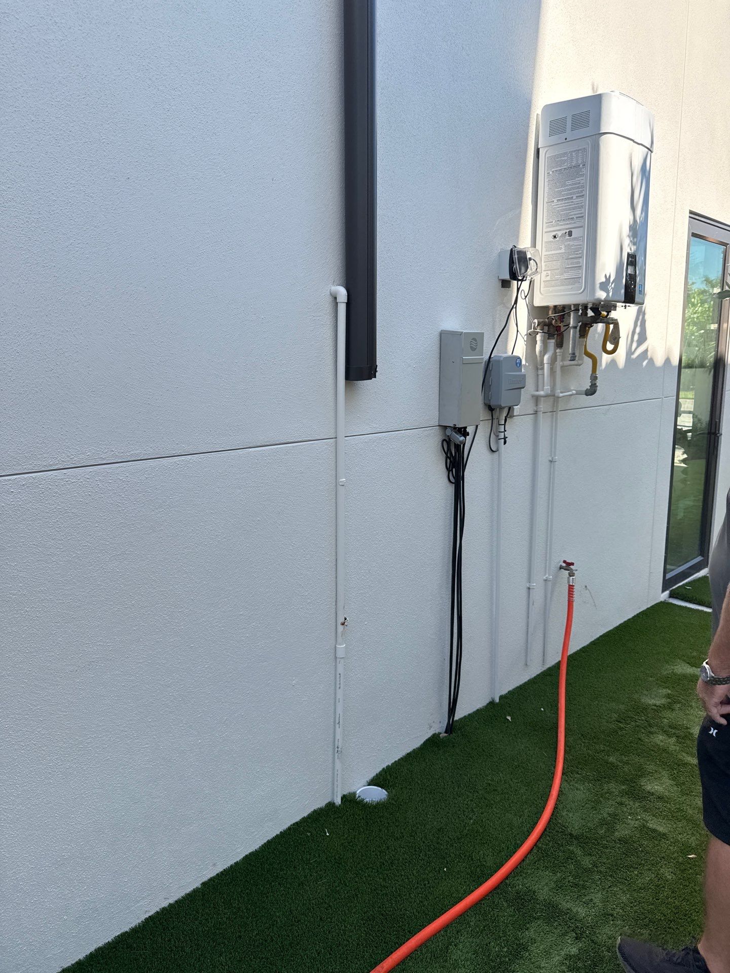 Seamless Aluminum Gutter Installation using black seamless gutters in Sarasota FL by Gutter Professors