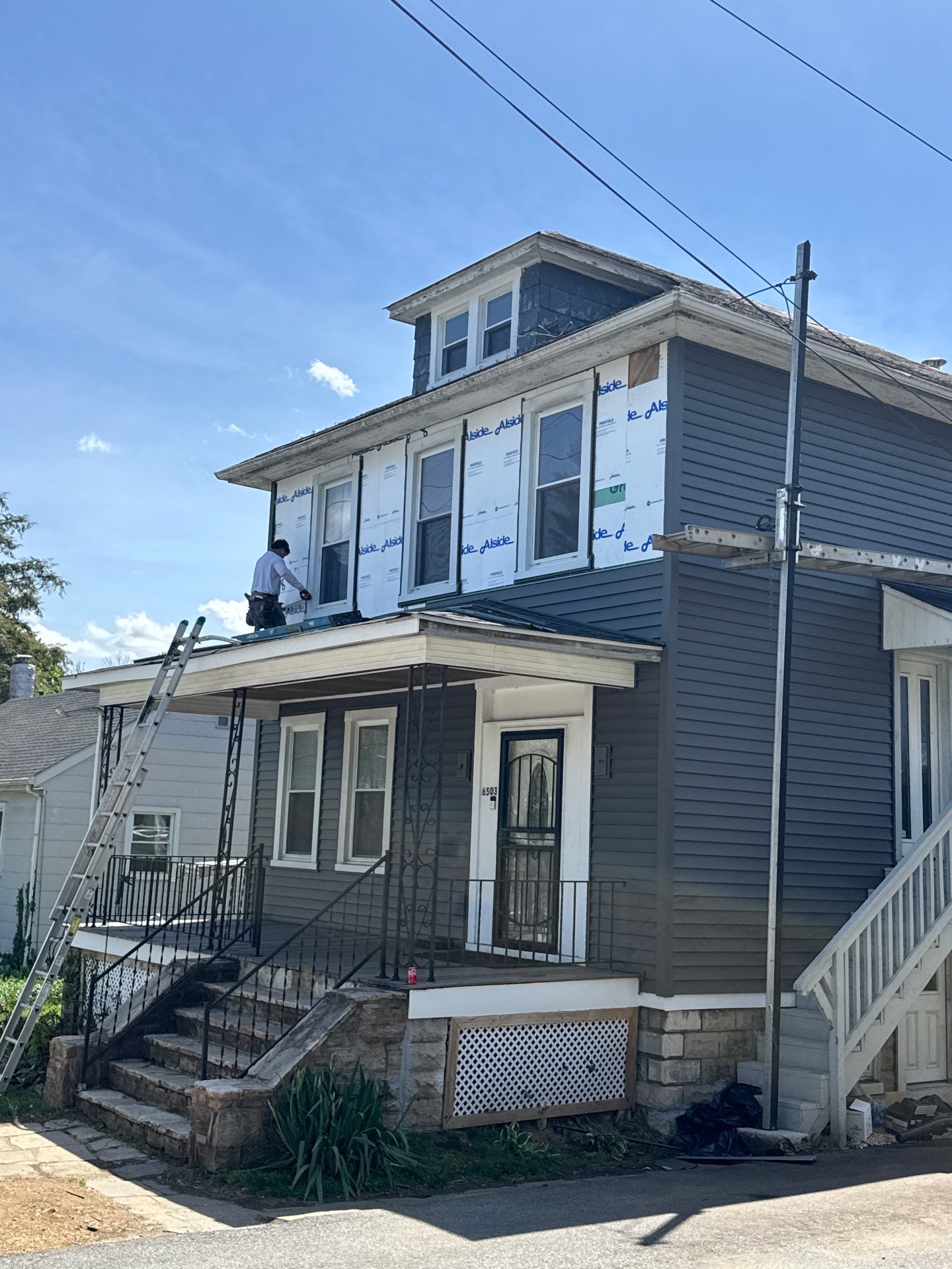 New siding & New Gutters by Alpha Design Services