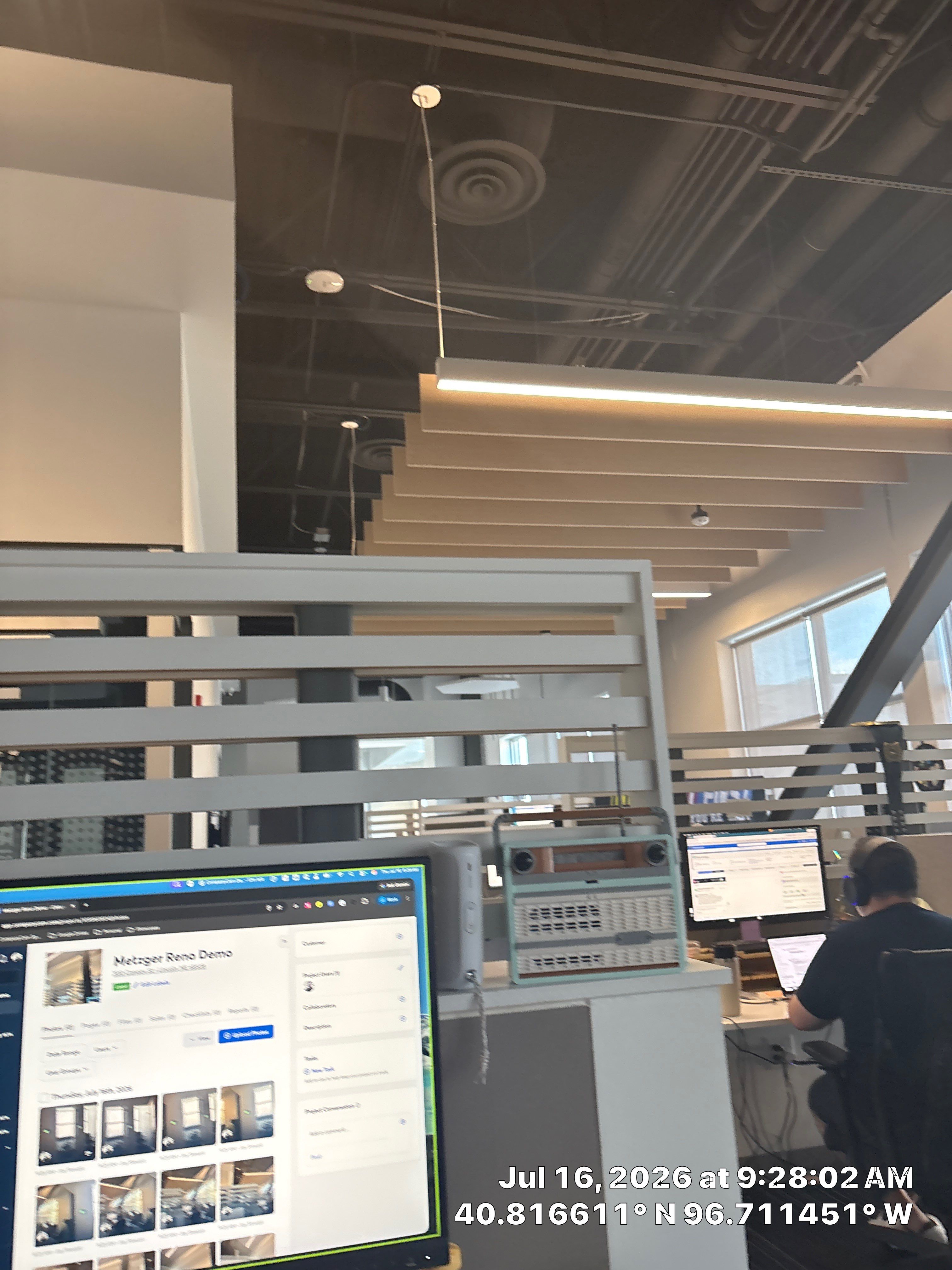 Modern Office Interior Renovation and Acoustic Baffles in Lincoln by CompanyCam Sales Demo