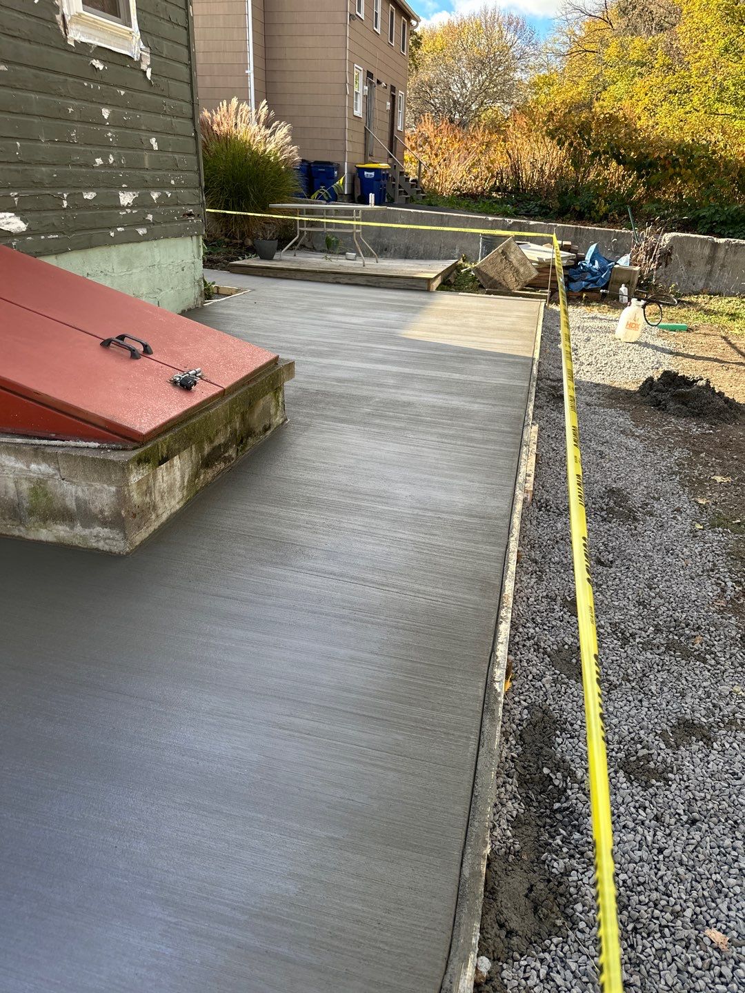 Broom finished concrete patio  by NG Masonry & Construction LLC