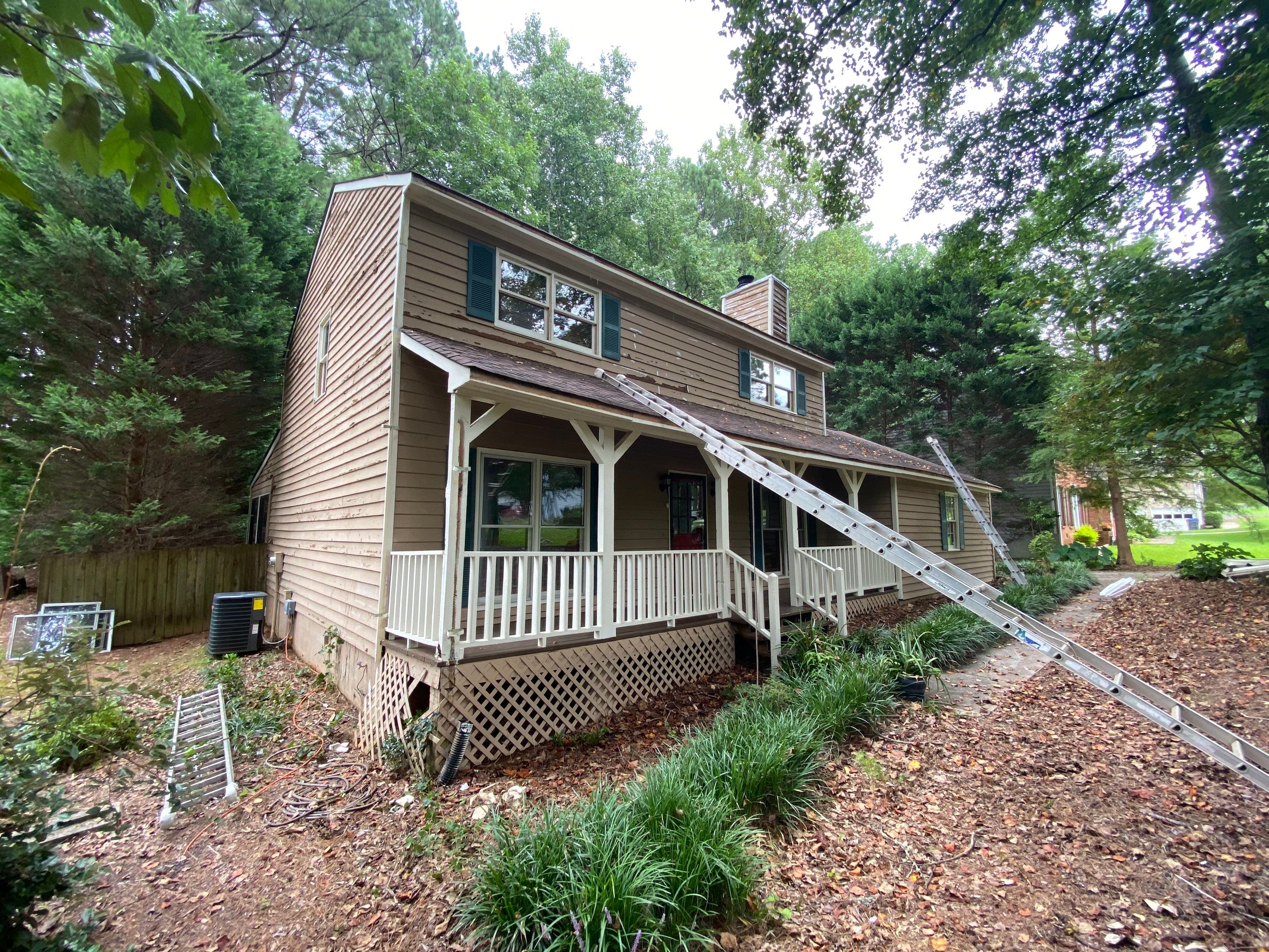 Mableton Exterior Painting and Pressure Treated Wood Deck Installation by Swift Home Renovations