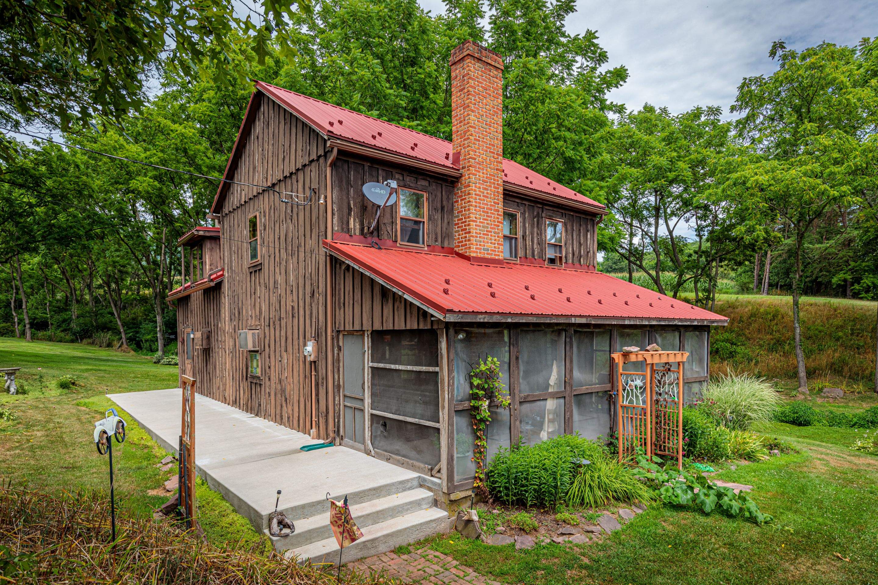 Metal Roof-colonial red by Esh Builders