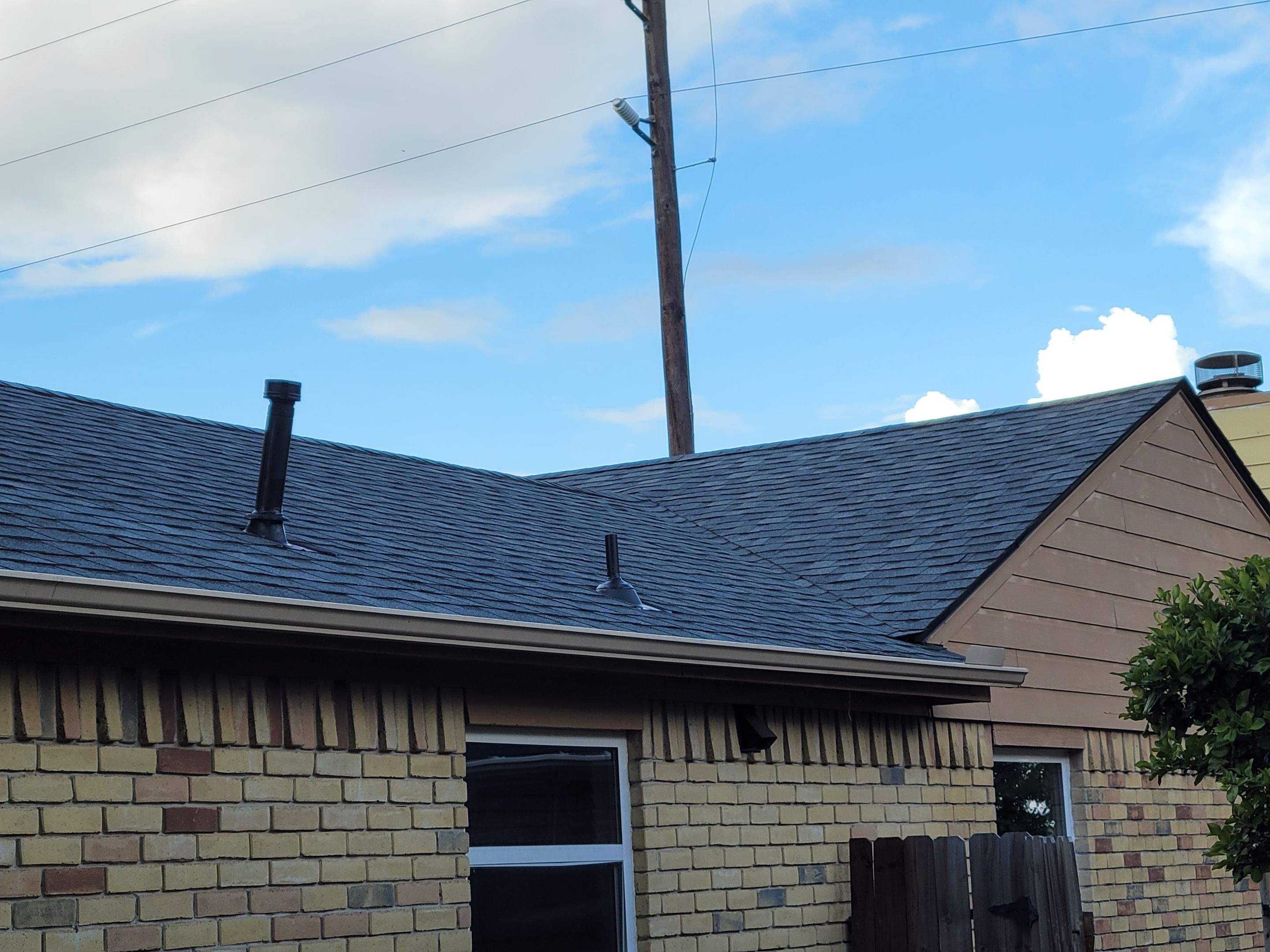 IKO Charcoal Gray Shingle Roof Replacement — Houston, TX by PL Roofing & SB Roofing, LLC.