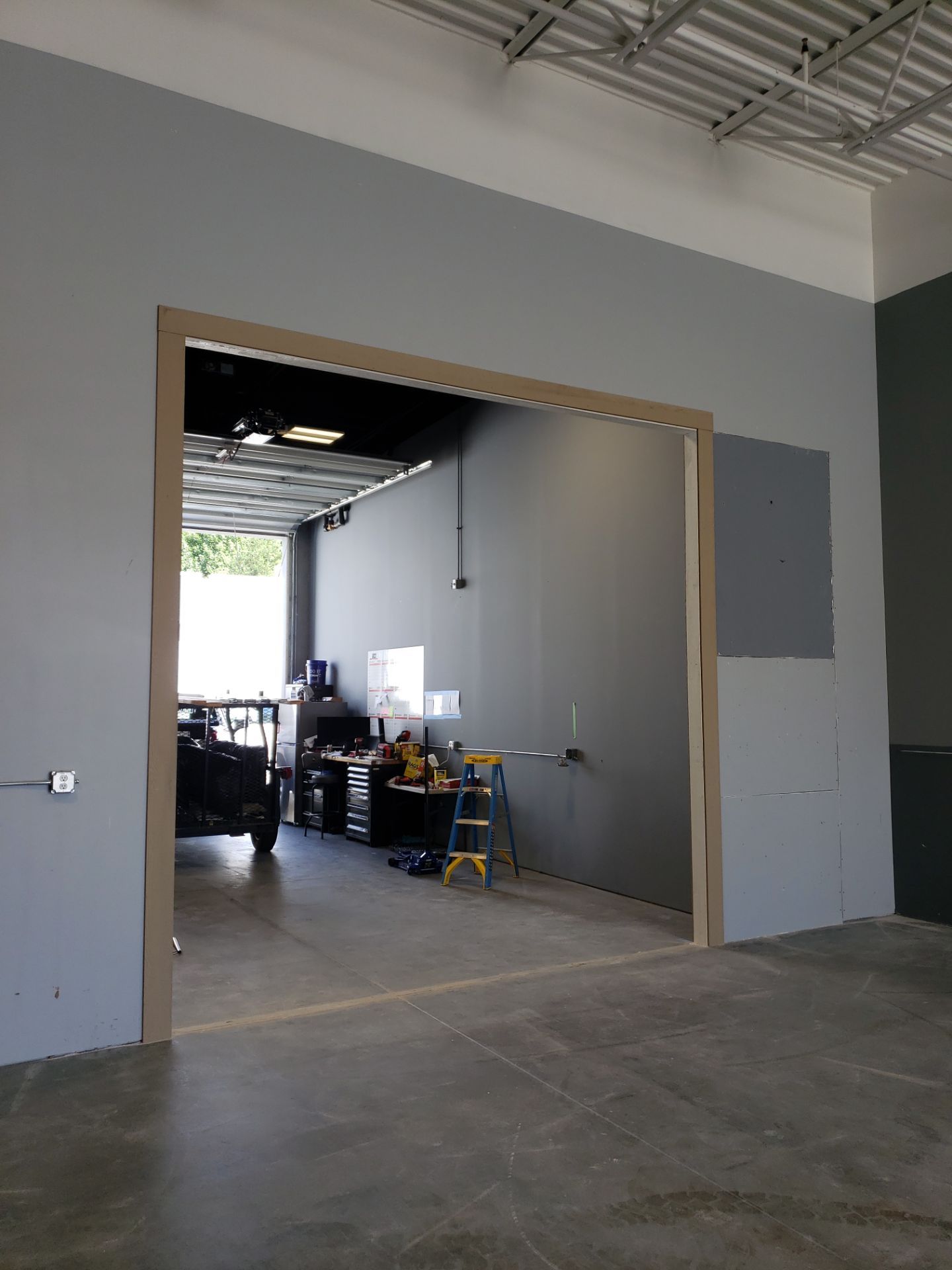 Commercial Shop Expansion Complete by A Step Above Handy LLC