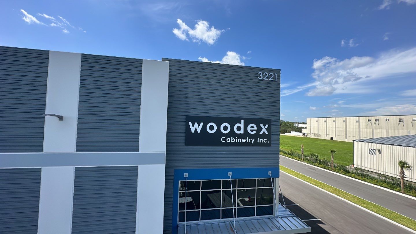 Acrylic Letters on Aluminum Backer for Woodex Cabinetry by SignCrafters