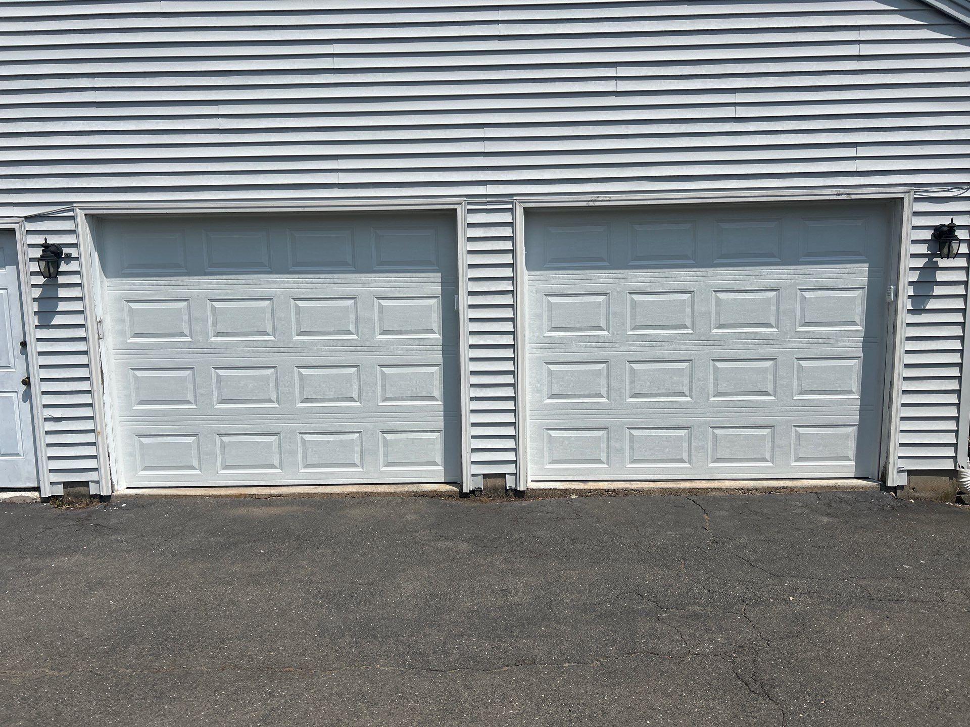 Double Garage Door Transformation by DiGiorgi Roofing and Siding Inc