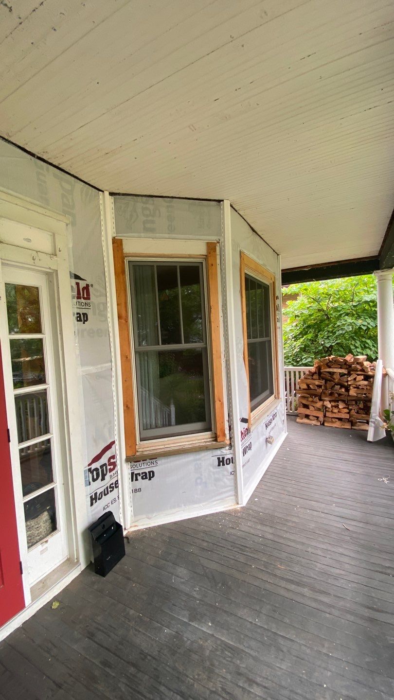 Asphalt Roof, Vinyl Siding, and Aluminum Gutter Replacement by Custom Installations