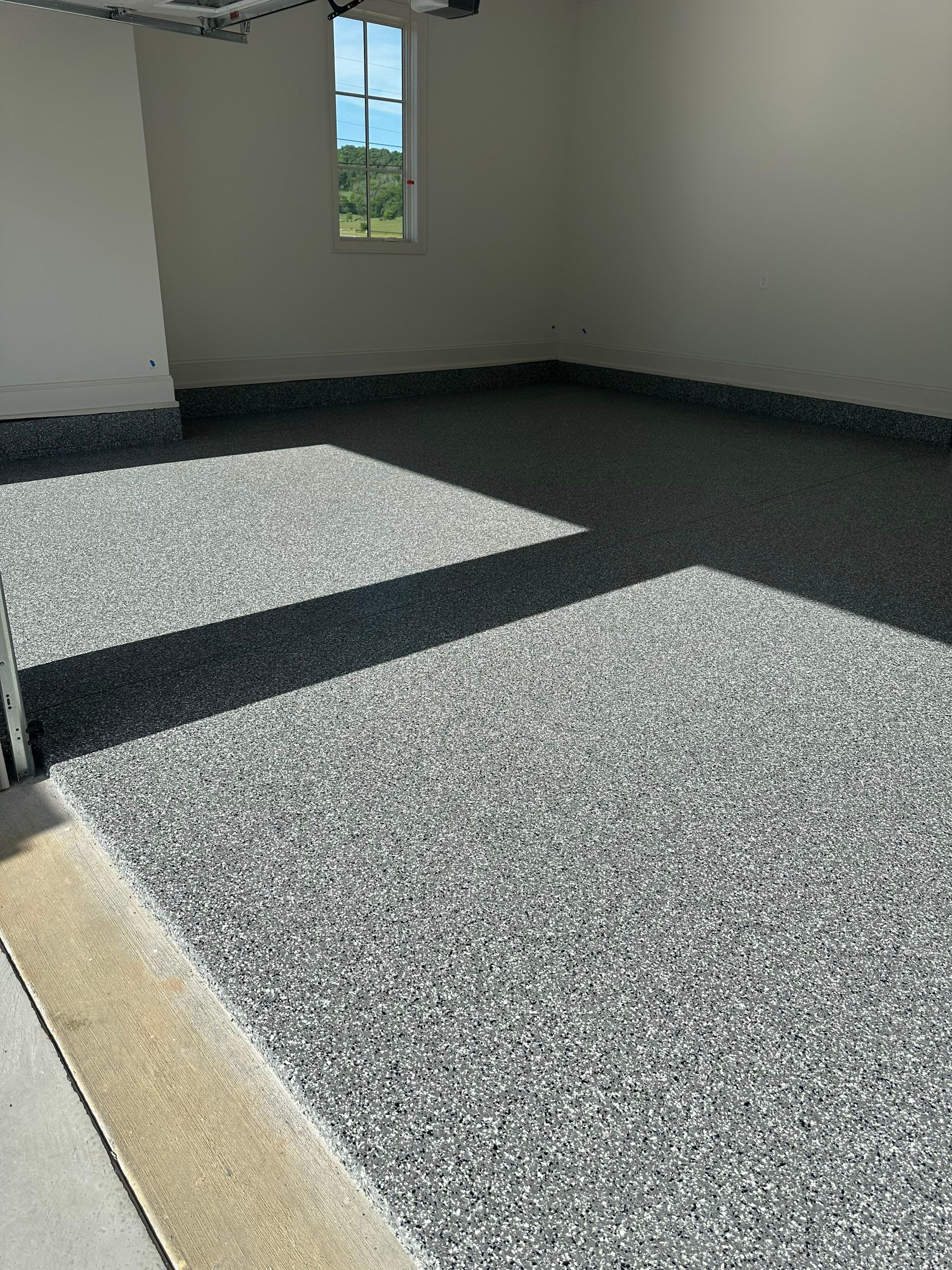 Garage Floor Coating using Wombat by My Garage Floor Guys