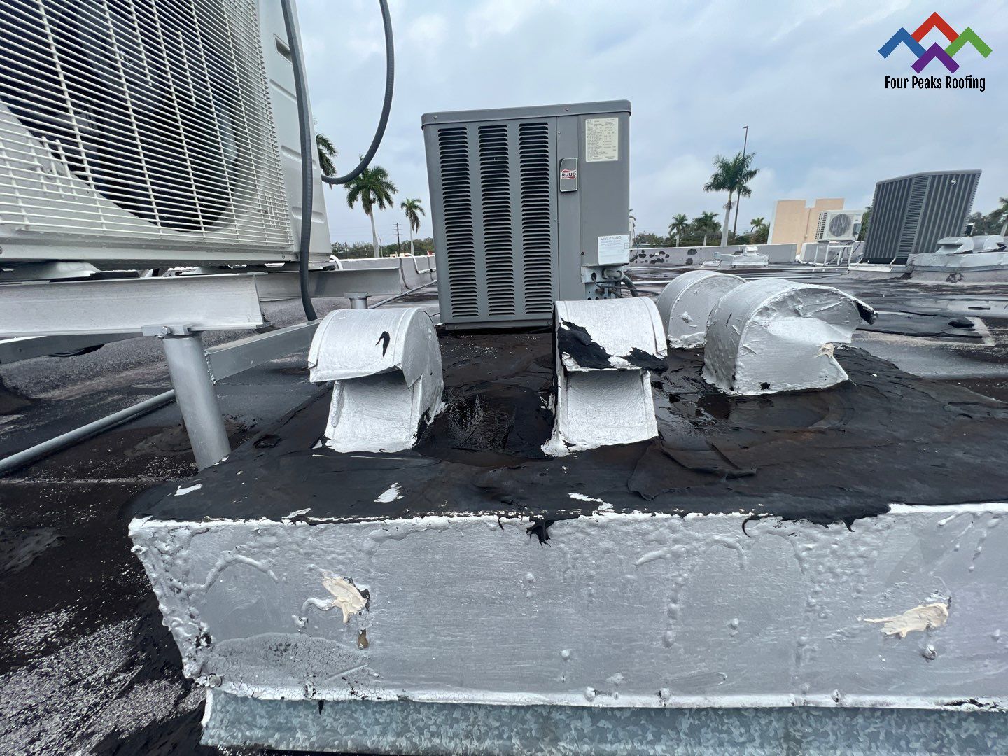Commercial Roofing Repair using Roof Sealant by Four Peaks Roofing