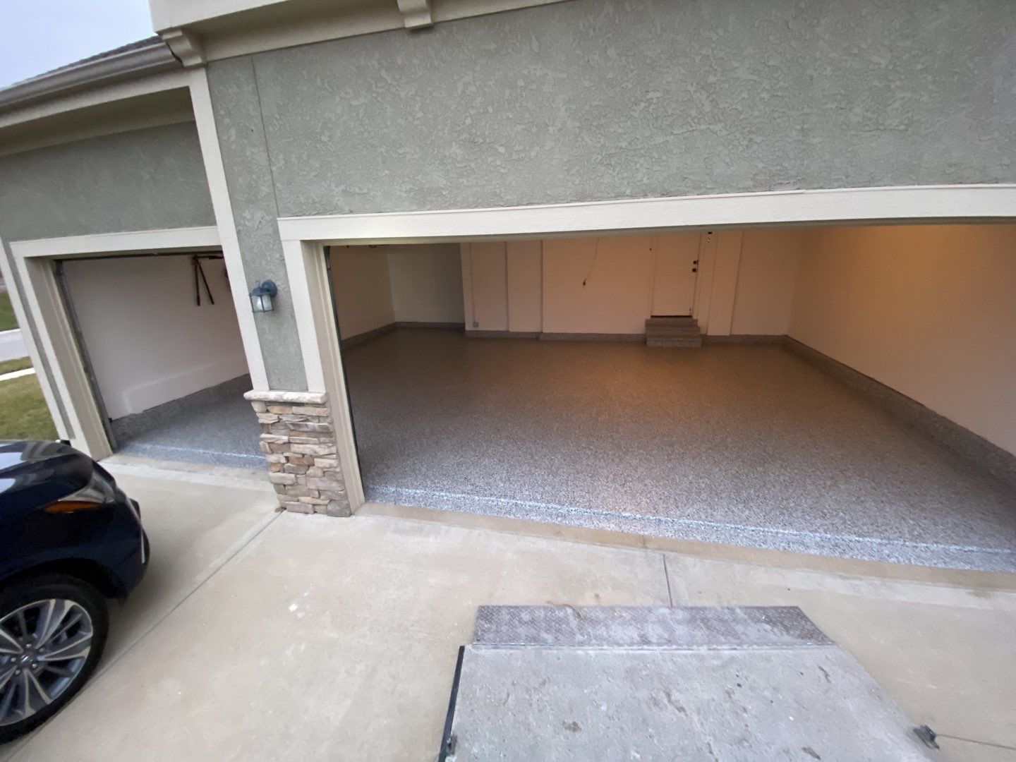 Garage using Domino  by Select Painting, Coatings & Garage Cabinets