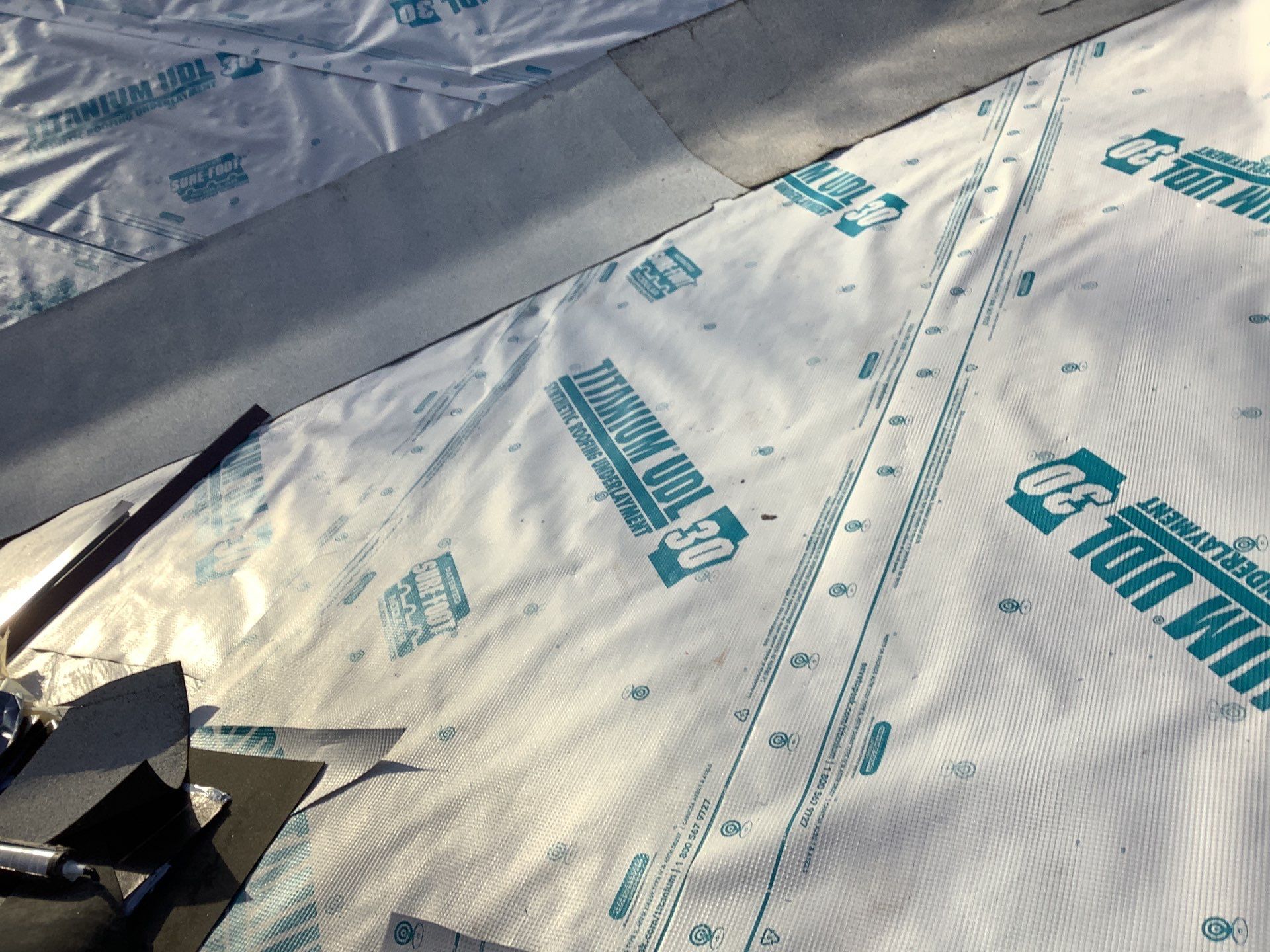 Residential Roofing Installation using Owens Corning Roofing Shingles by Byers Enterprises 