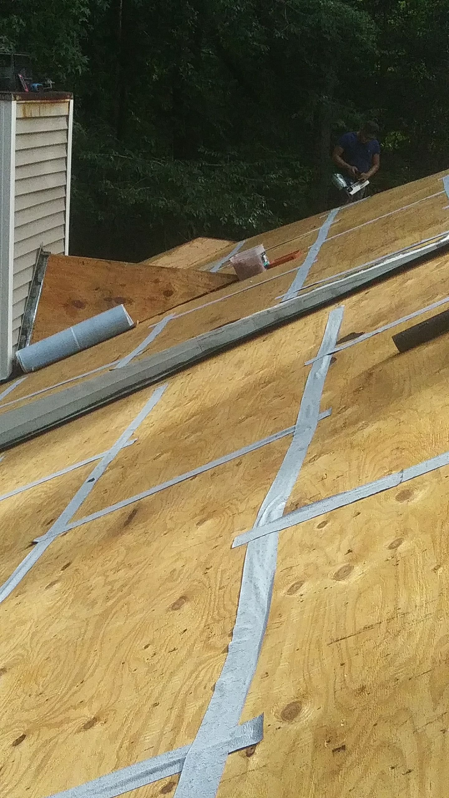 Residential Roofing Installation using Roof Replacement by American Roofing & Construction LLC