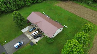 Residential Roofing Installation using Performance Panel Metal - Coca Brown