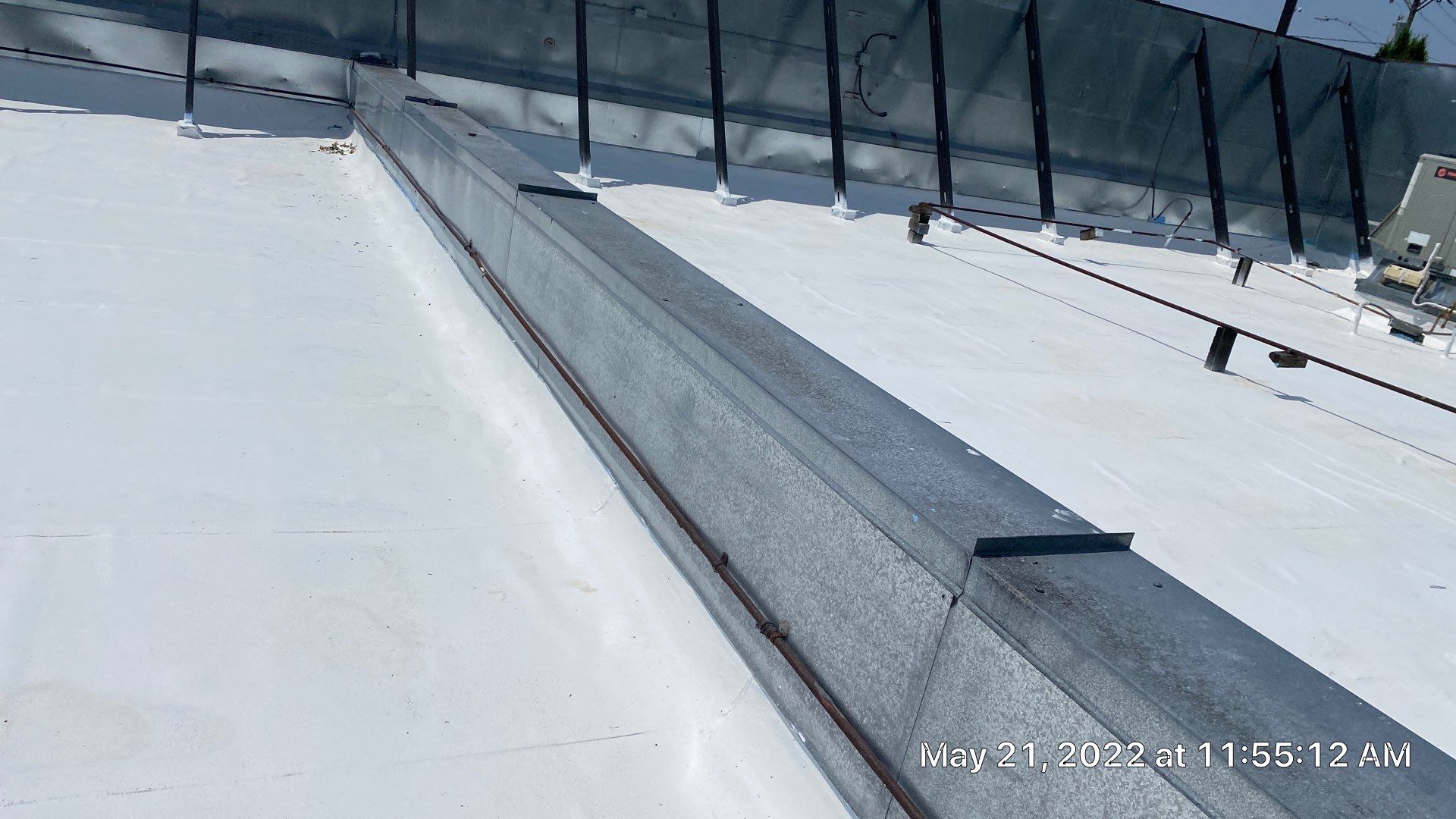 Commercial Roof Coating using Fiberseal basecoat and Silicon Topcoat by Just In Time Roofing and Restoration