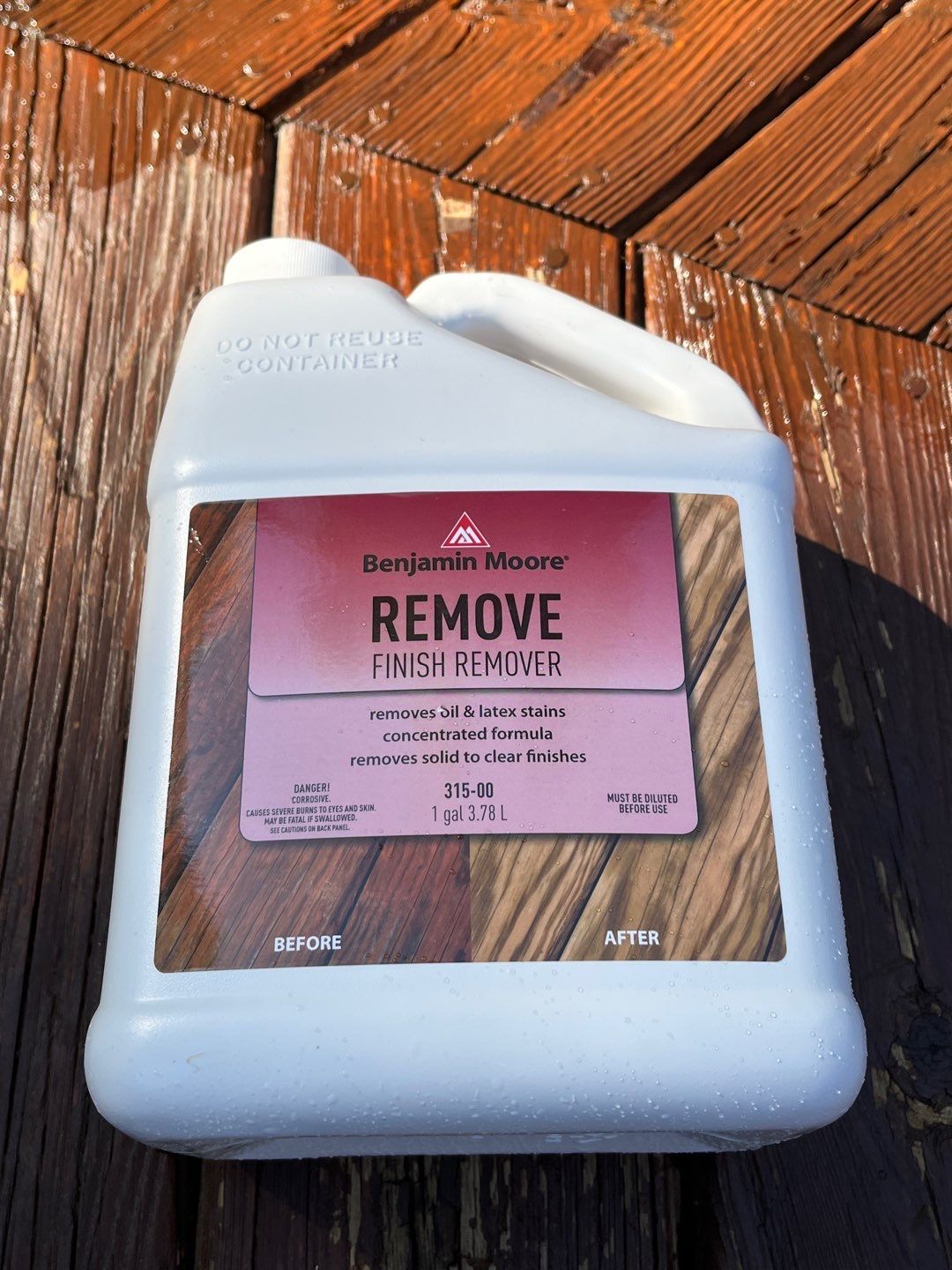 Triple deck re-staining by AKK Painting LLC