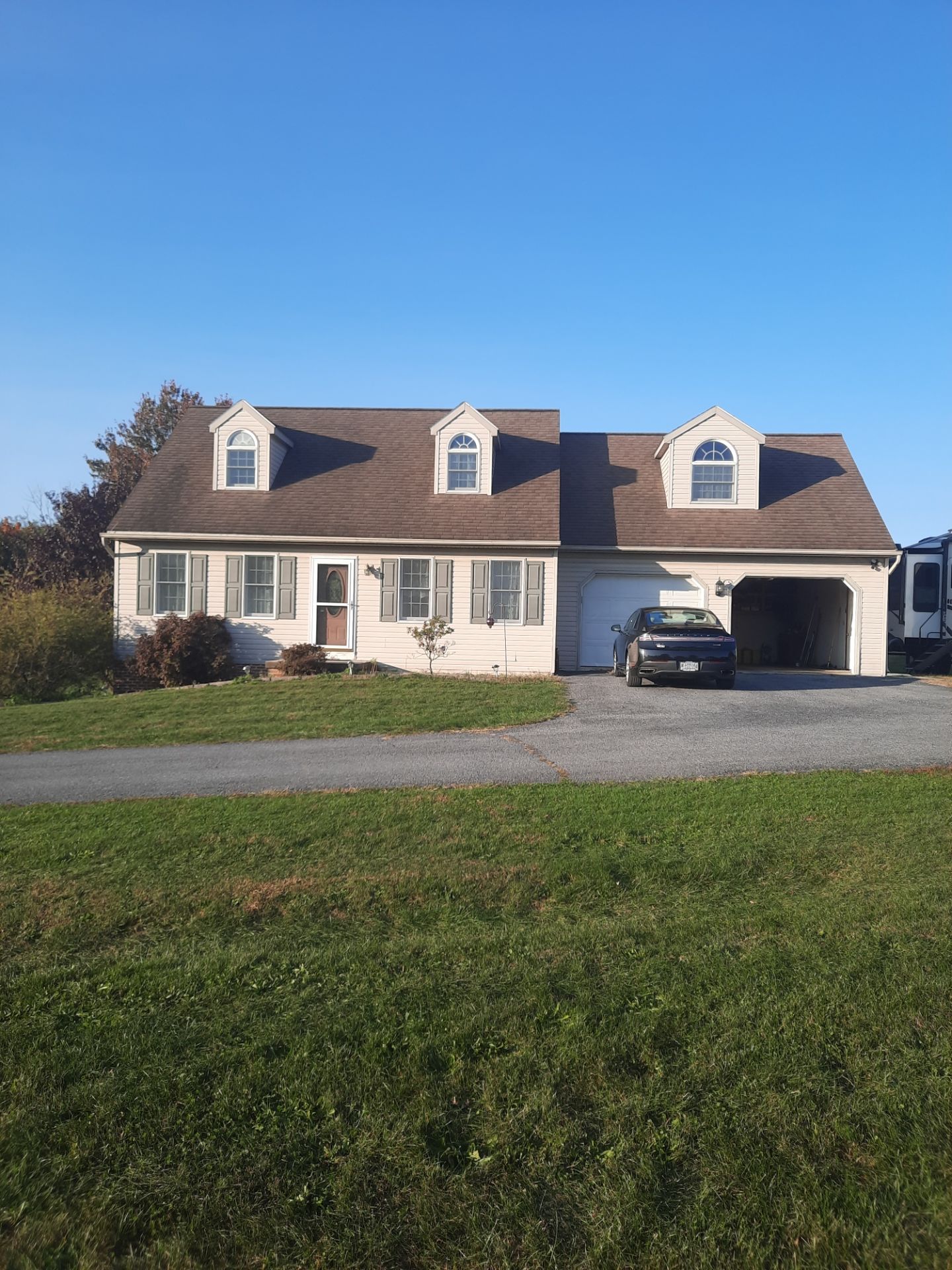 Custom Porch Roof Addition and Siding Renovation in Myerstown, PA by Esh Builders