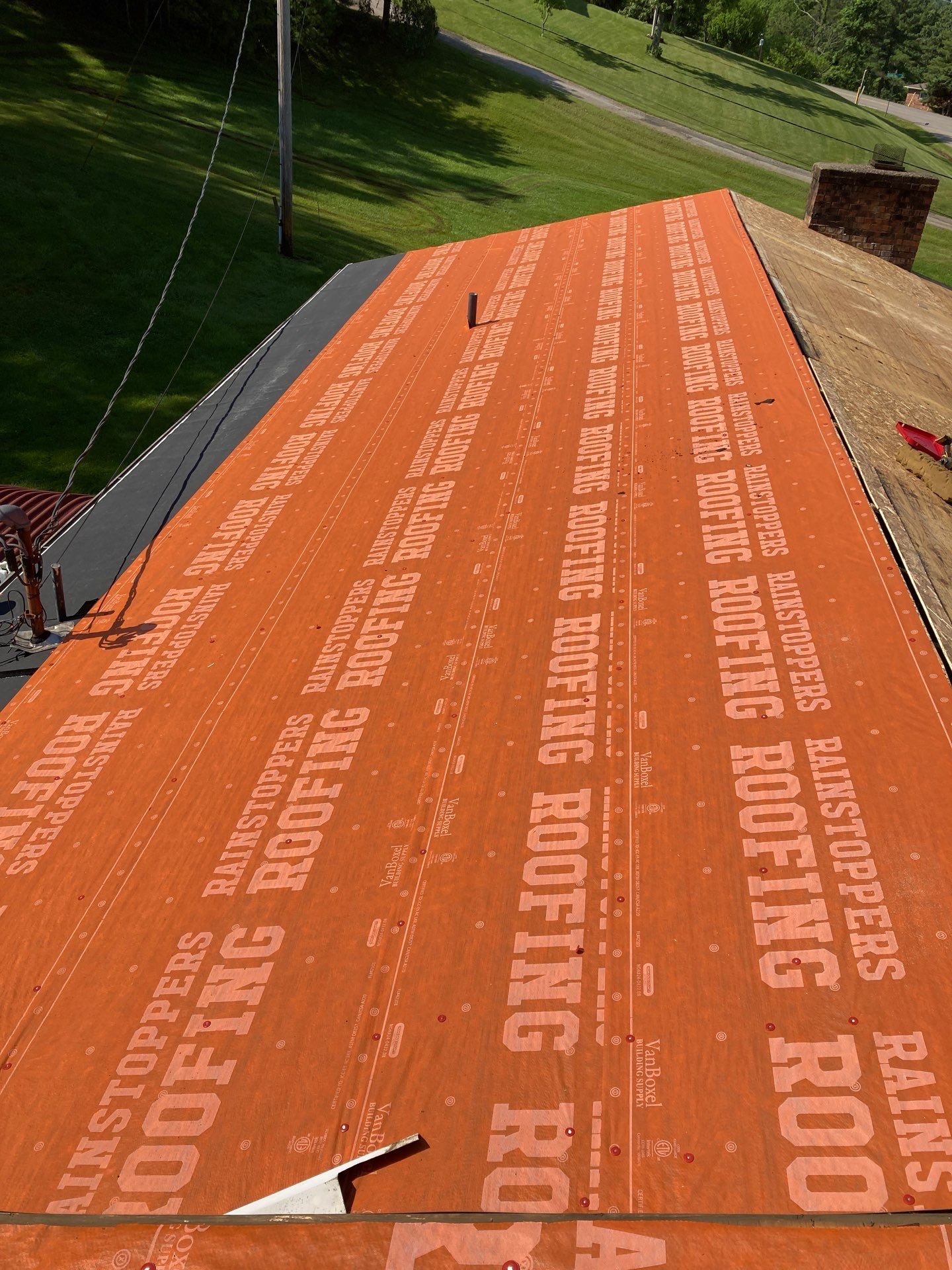 Residential Roofing Installation using GAF Timberline HDZ Charcoal by Rainstoppers Roofing