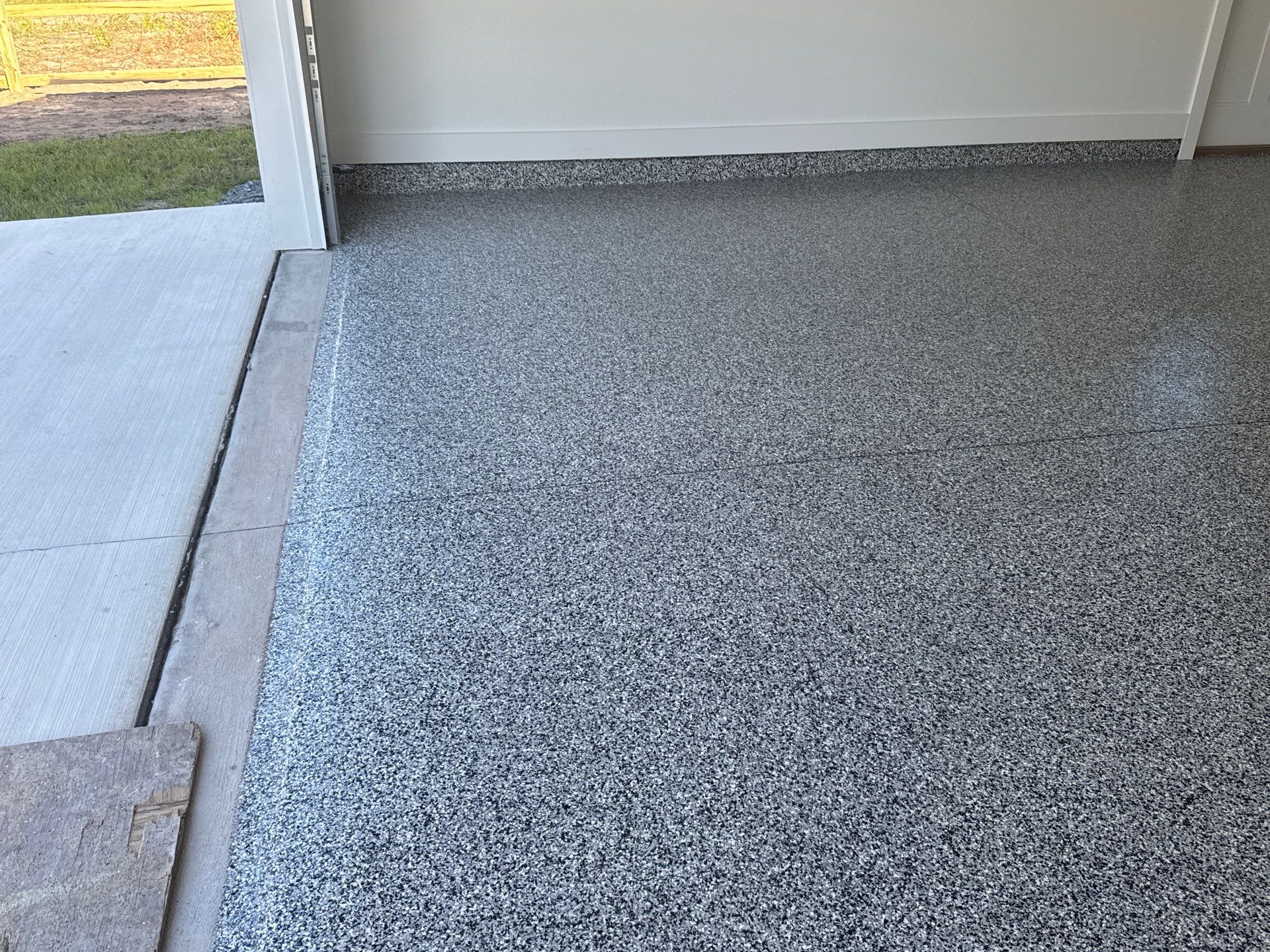 Garage in Domino by Cross Creek Concrete Coatings