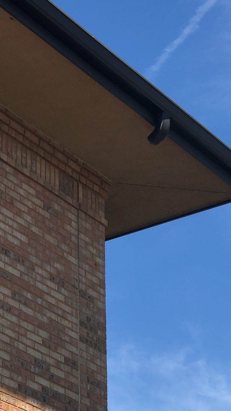 Pensacola Realtor Association Gutter Installation using K-Style White Gutters by Gutter Professors