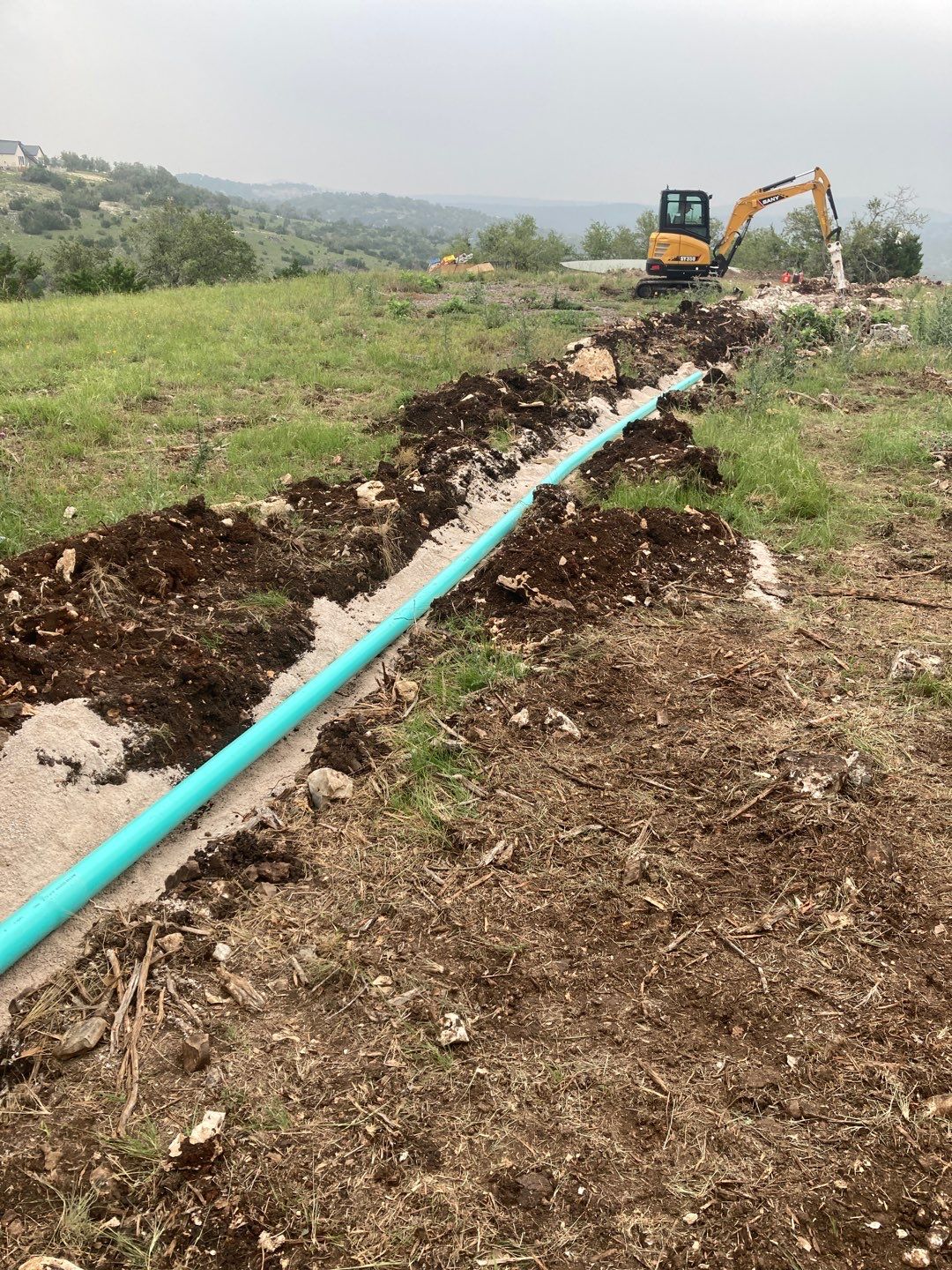 Residential Rainwater Collection System - Pioneer 40K gallon water tank in Mangrove Green by Hill Country Rain Water